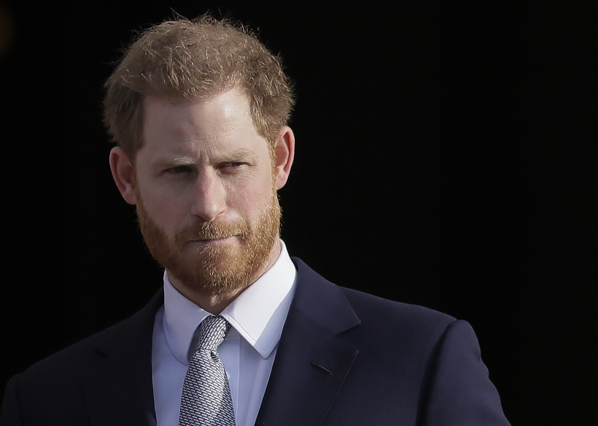 FILE - Britain's Prince Harry arrives in the gardens of Buckingham Palace in London, Jan 16, 2020. Buckingham Palace says Prince Harry will attend the Coronation service of his father, King Charles III, at Westminster Abbey on May 6, setting aside months of speculation about his presence. (AP Photo/Kirsty Wigglesworth, File)