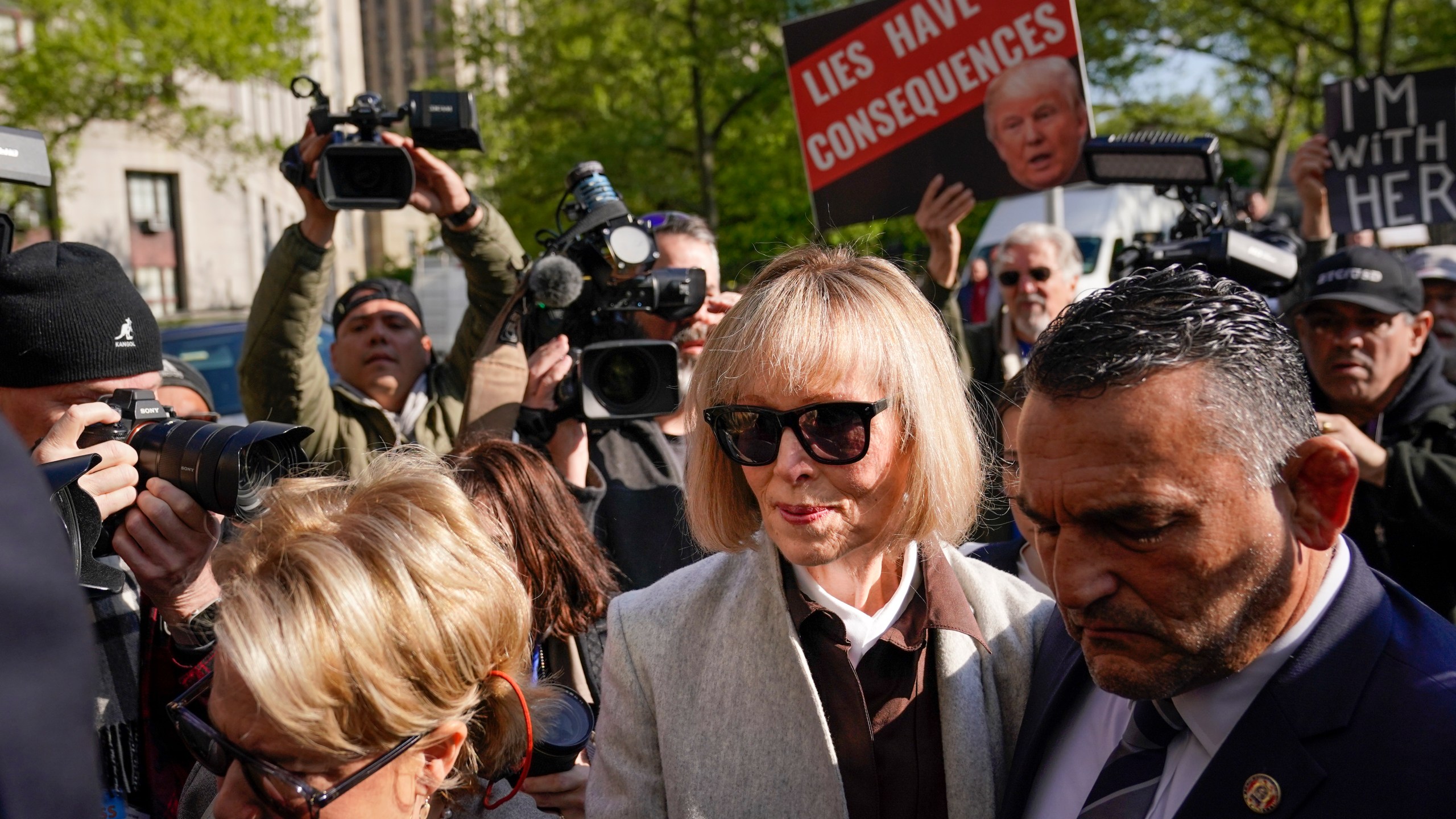 Former advice columnist E. Jean Carroll walks into Manhattan federal court on Tuesday, April 25, 2023, in New York. Jury selection is scheduled to begin in a trial over Carroll's claim that former President Donald Trump raped her nearly three decades ago in a department store dressing room. (AP Photo/Seth Wenig)