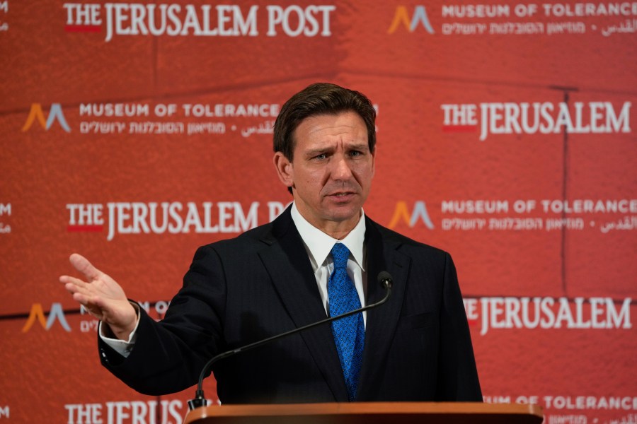 Florida Gov. Ron DeSantis talks to the media at a conference titled "Celebrate the Faces of Israel" at Jerusalem's Museum of Tolerance, Thursday, April 27, 2023. (AP Photo/Maya Alleruzzo)