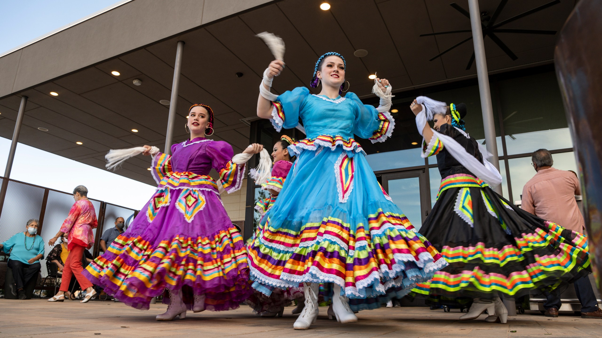 FILE -Young Folklorico dancers from the group Viva Mexico begin their dance routine at a Cinco de Mayo celebration hosted by the Odessa Hispanic Chamber of Commerce at the Odessa Marriott Hotel and Convention Center, Wednesday, May 5, 2021, in Odessa, Texas. American bars and restaurants gear up every year for Cinco de Mayo, offering special deals on Mexican food and alcoholic drinks for the May 5 holiday that is barely celebrated south of the border. (Eli Hartman/Odessa American via AP, File)