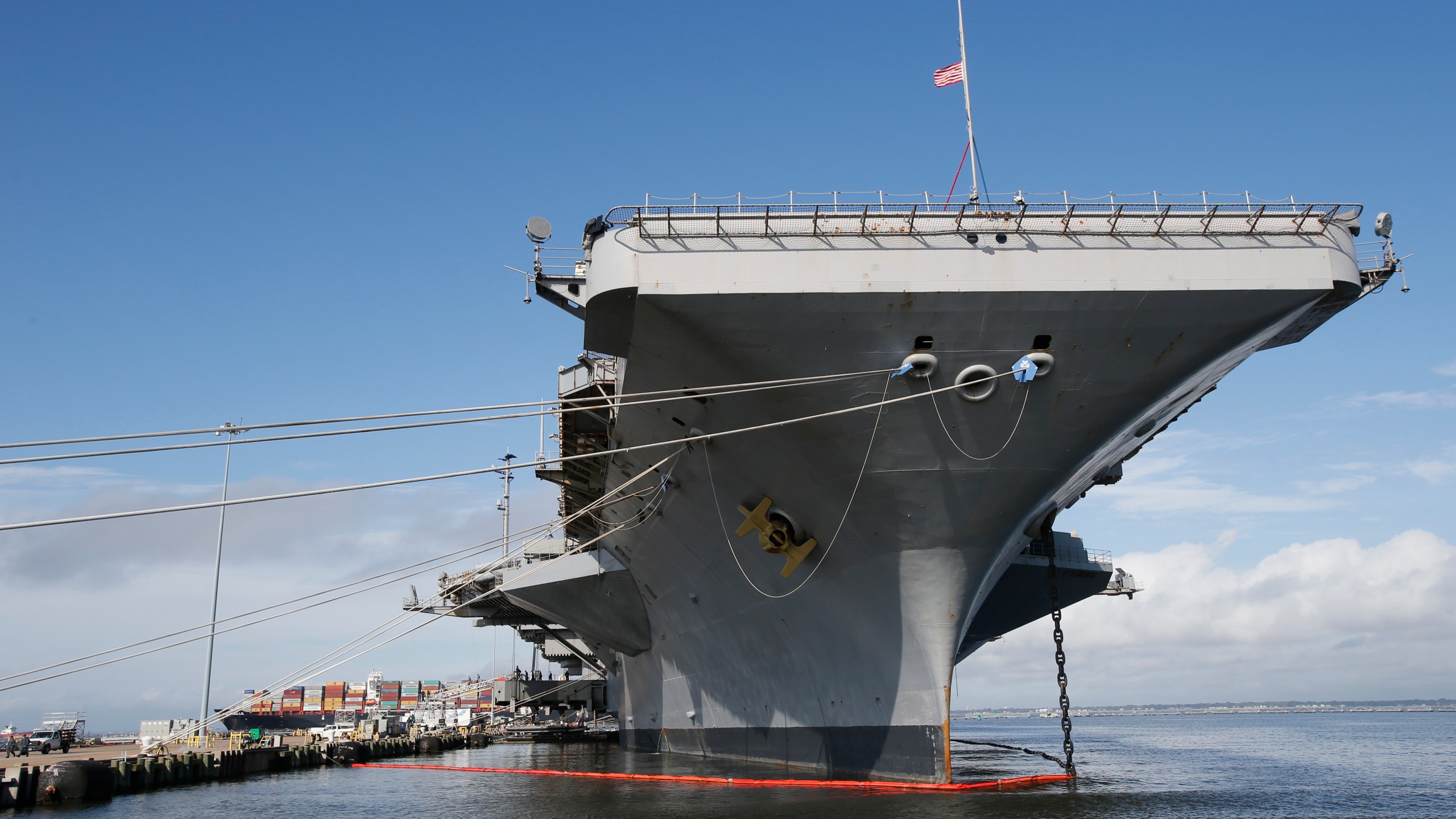 FILE - The nuclear aircraft carrier USS George Washington pier side at Norfolk Naval Station in Norfolk, Va., Sept. 30, 2016. A Navy investigation triggered by a series of suicides is recommending widespread improvements in housing, food, parking and internet for sailors, as well as changes to mental health and other personnel programs. The investigation began last year after seven service members assigned to the aircraft carrier USS George Washington died over a 12-month period ending April 2022, including three in one week. The carrier was docked for overhaul at Newport News shipyard. (AP Photo/Steve Helber, File)