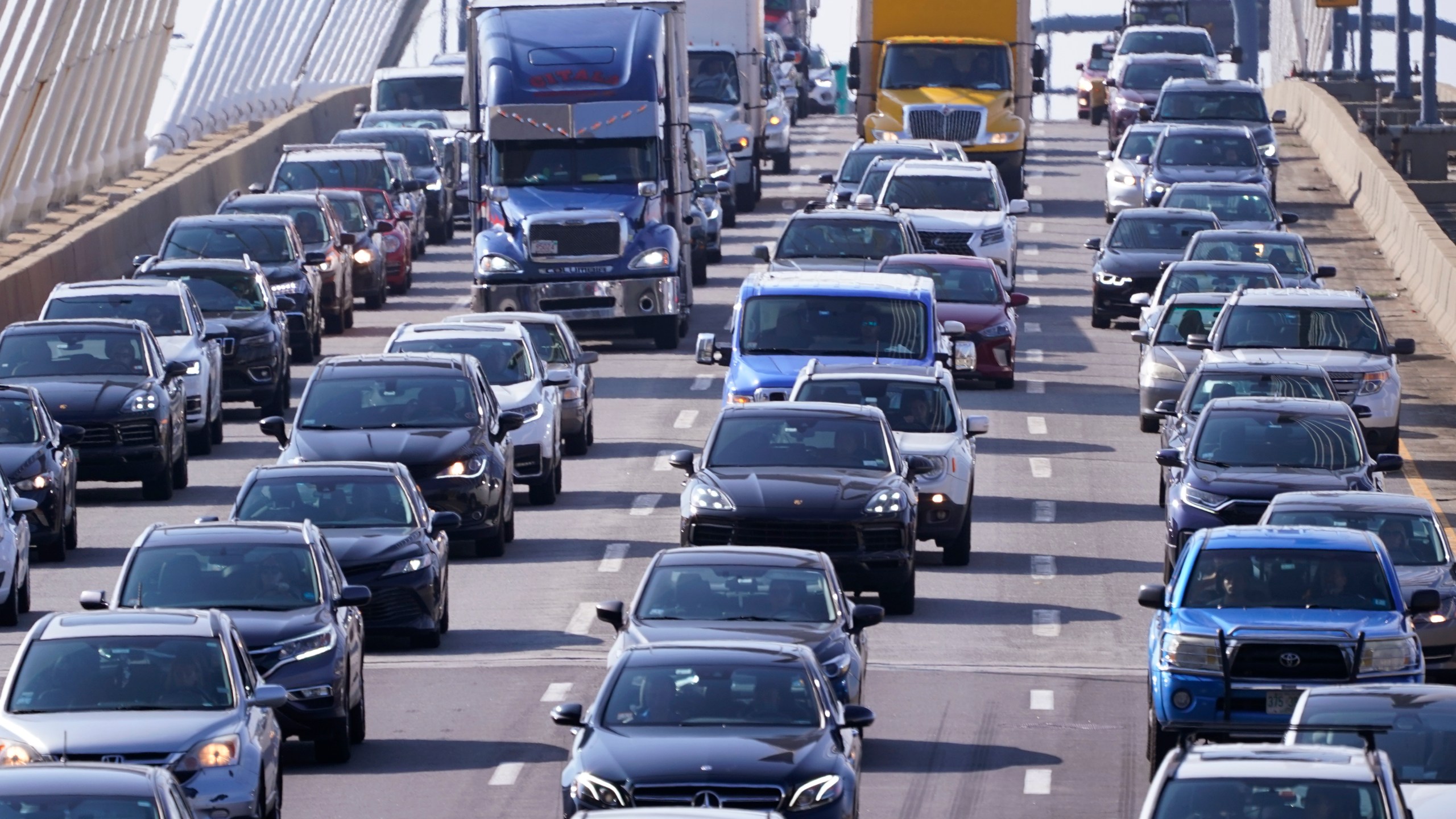 File - Automobile traffic jams Route 93 South, Wednesday, July 14, 2021, in Boston. More than 33 million people in the United States are driving vehicles that contain a potentially deadly threat: Airbag inflators that in rare cases can explode in a collision and spew shrapnel. (AP Photo/Charles Krupa, File)