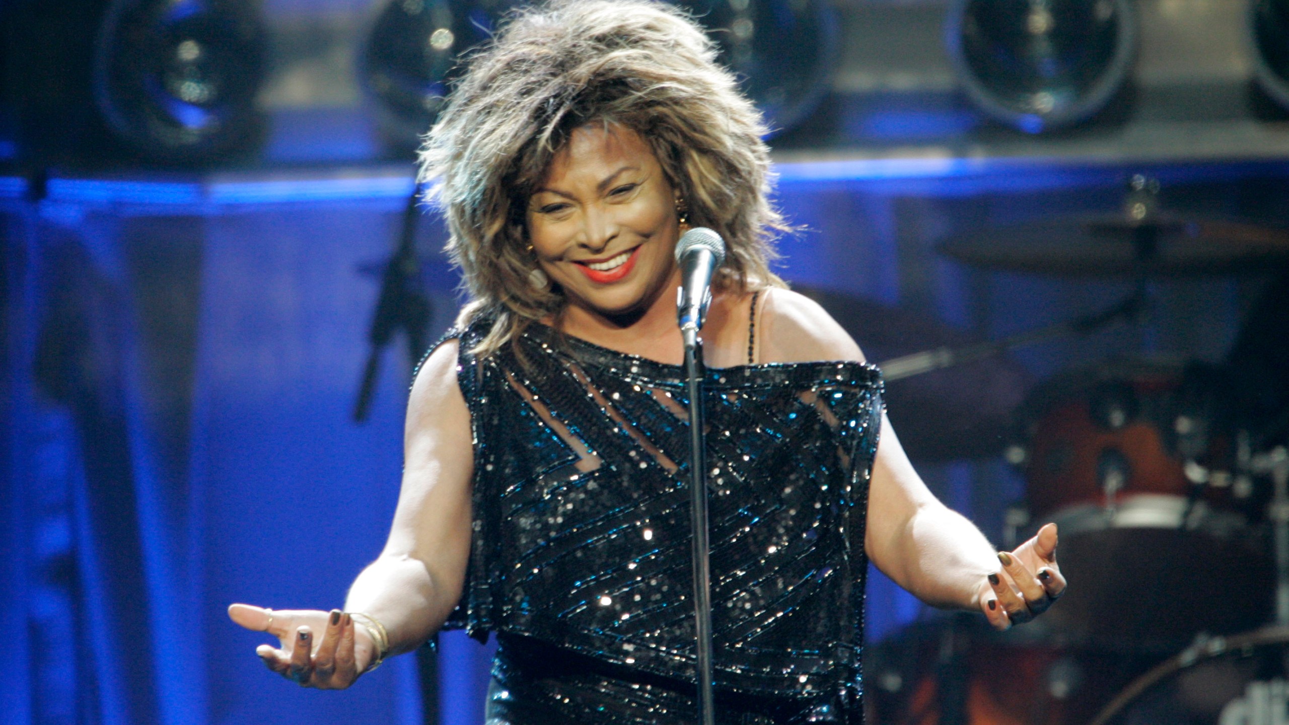 FILE - Tina Turner performs at The Sprint Center in Kansas City, Mo., on Oct. 1, 2008, the first stop on her Tina!: 50th Anniversary Tour. (AP Photo/Orlin Wagner, File)