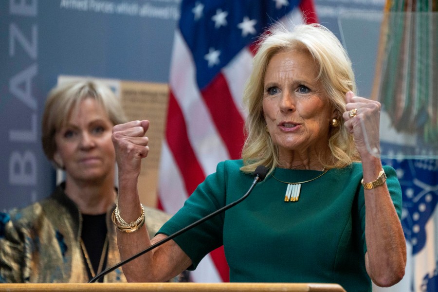 First lady Jill Biden, right, next to Phyllis Wilson, President of the Military Women's Memorial, speaks during an event honoring women in the military on the 75th Anniversary of the Women's Armed Services Integration Act, Monday, June 12, 2023, at the Military Women's Memorial at Arlington National Cemetery in Arlington, Va. (AP Photo/Jacquelyn Martin)