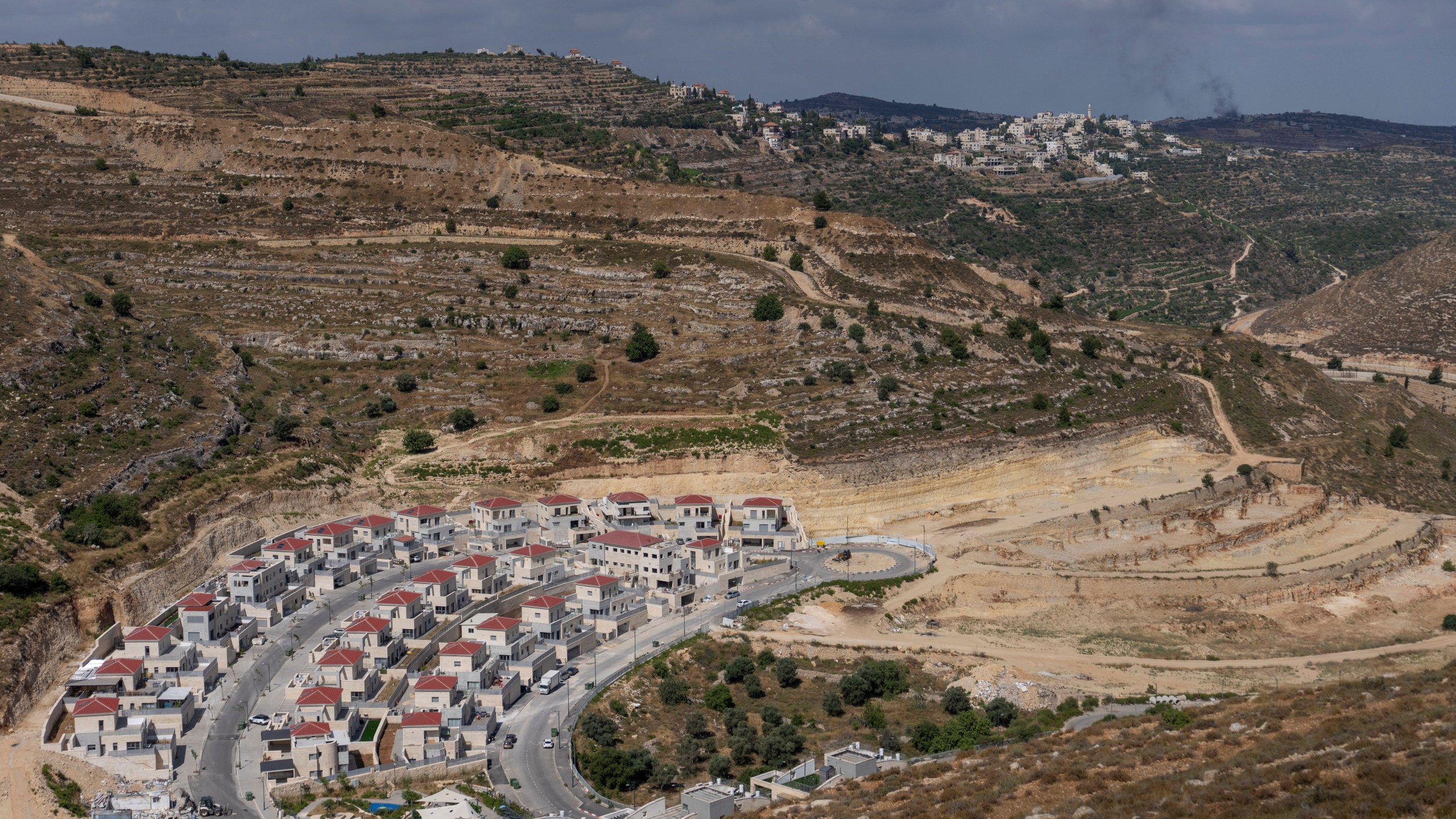 FILE - This file photo shows a part of new housing projects in the West Bank Israeli settlement of Givat Ze'ev, Monday, June 18, 2023. Israel’s far-right government on Monday, June 26, 2023, approved plans to build thousands of new homes in the occupied West Bank — a move that threatened to worsen increasingly strained relations with the United States. (AP Photo/Ohad Zwigenberg, File)