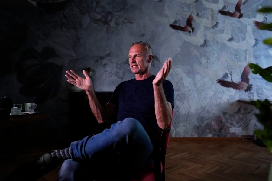 Former NHL goalkeeper Dominik Hasek gestures during an interview with The Associated Press in Prague, Czech Republic, Wednesday, June 28, 2023. The NHL great has been a prominent and vocal critic of the International Olympic Committee's recommendation that Russians and Belarusians could compete in international competitions after being approved as neutrals. (AP Photo/Petr David Josek)