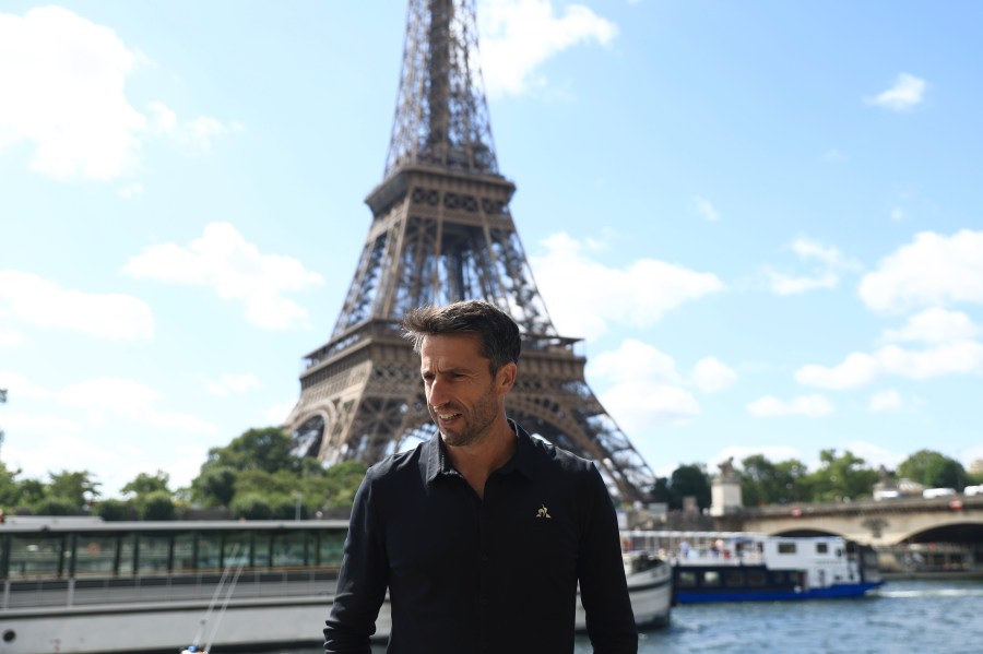 Paris 2024 Olympics Organizing Committee President Tony Estanguet poses after a test for the Paris 2024 Olympic Games opening ceremony, Monday, July 17, 2023 in Paris. Thousands of Olympic athletes on boats will cruise along the River Seine for the Paris 2024 Olympic Games on July 26, 2024.(AP Photo/Aurelien Morissard)