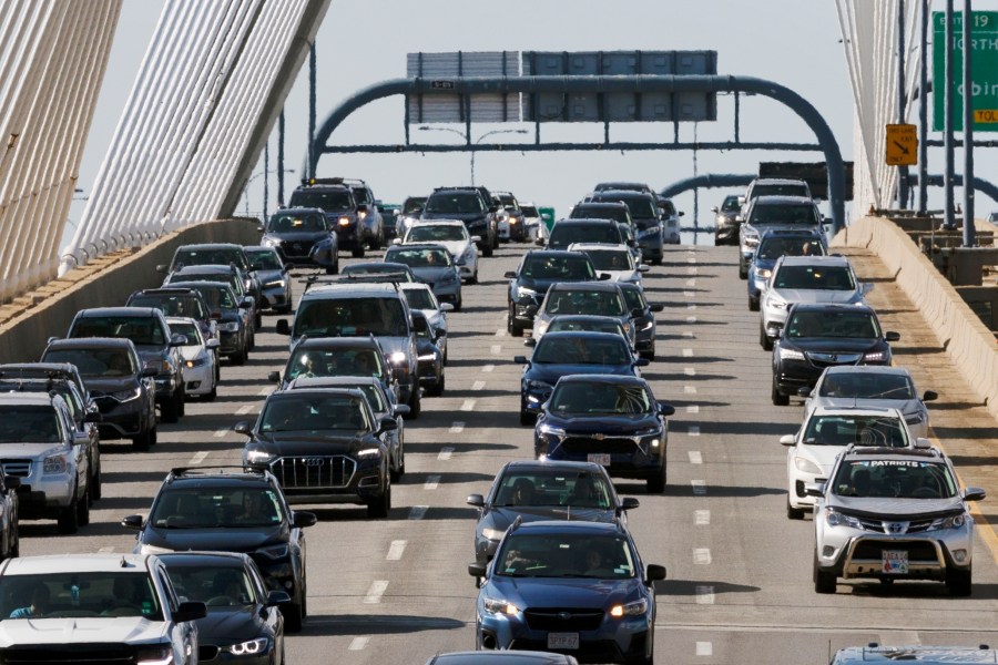 FILE - Heavy traffic heads south on Interstate 93 over the Zakim Bridge, Friday, Sep. 1, 2023, in Boston. Cars are getting an “F” in data privacy. A new study released Wednesday, Sept. 6, 2023, found that most major brands admit they may be selling your personal data, with half saying they will share it with the government or law enforcement without a court order. (AP Photo/Michael Dwyer, File)