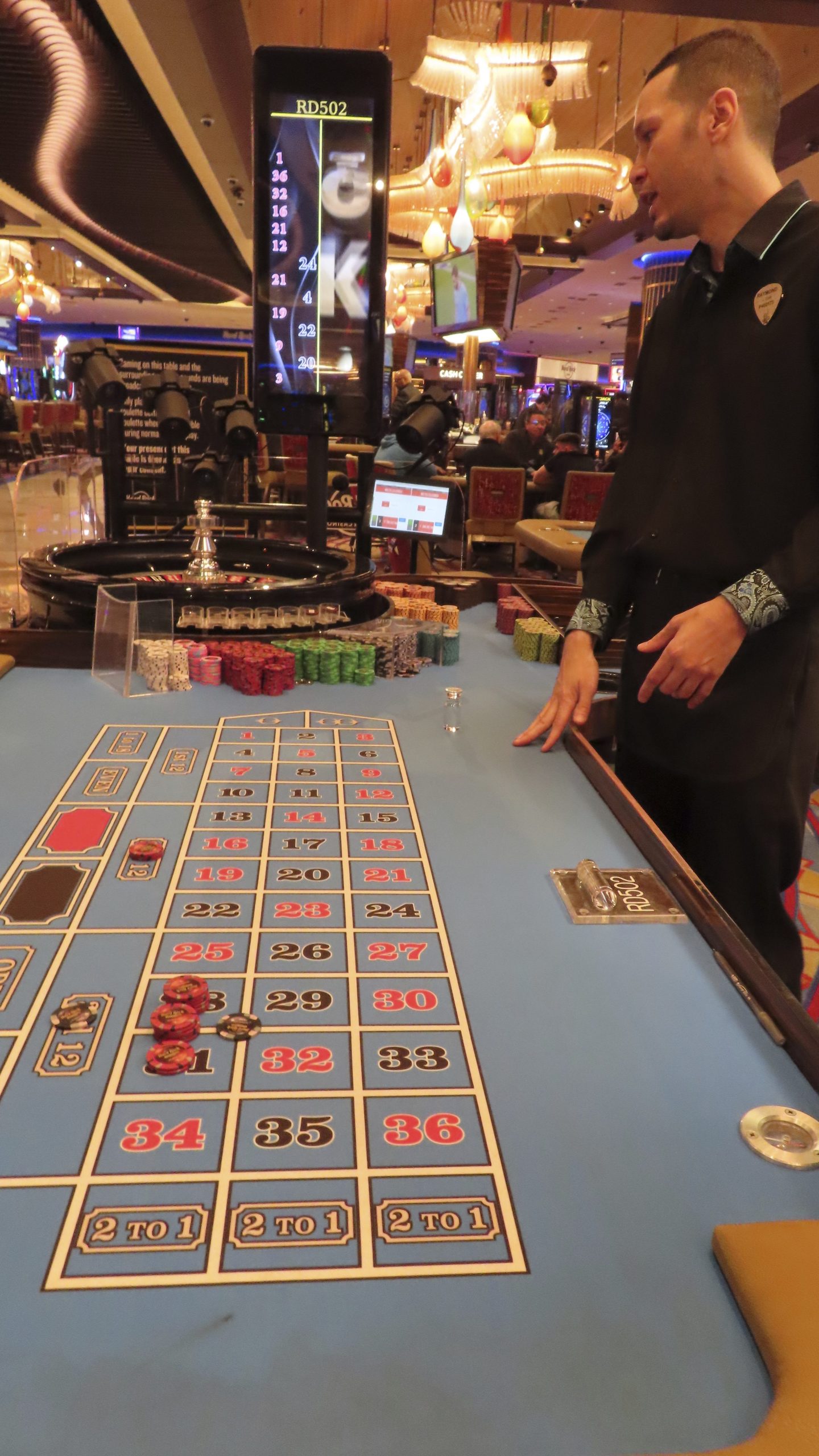 A dealer conducts a game of roulette at the Hard Rock casino in Atlantic City, N.J., on May 17, 2023. Commercial casinos in the U.S. had their best July ever this year, winning nearly $5.4 billion from gamblers, according to figures released on Sept. 14, 2023, by a national gambling industry group. (AP Photo/Wayne Parry)