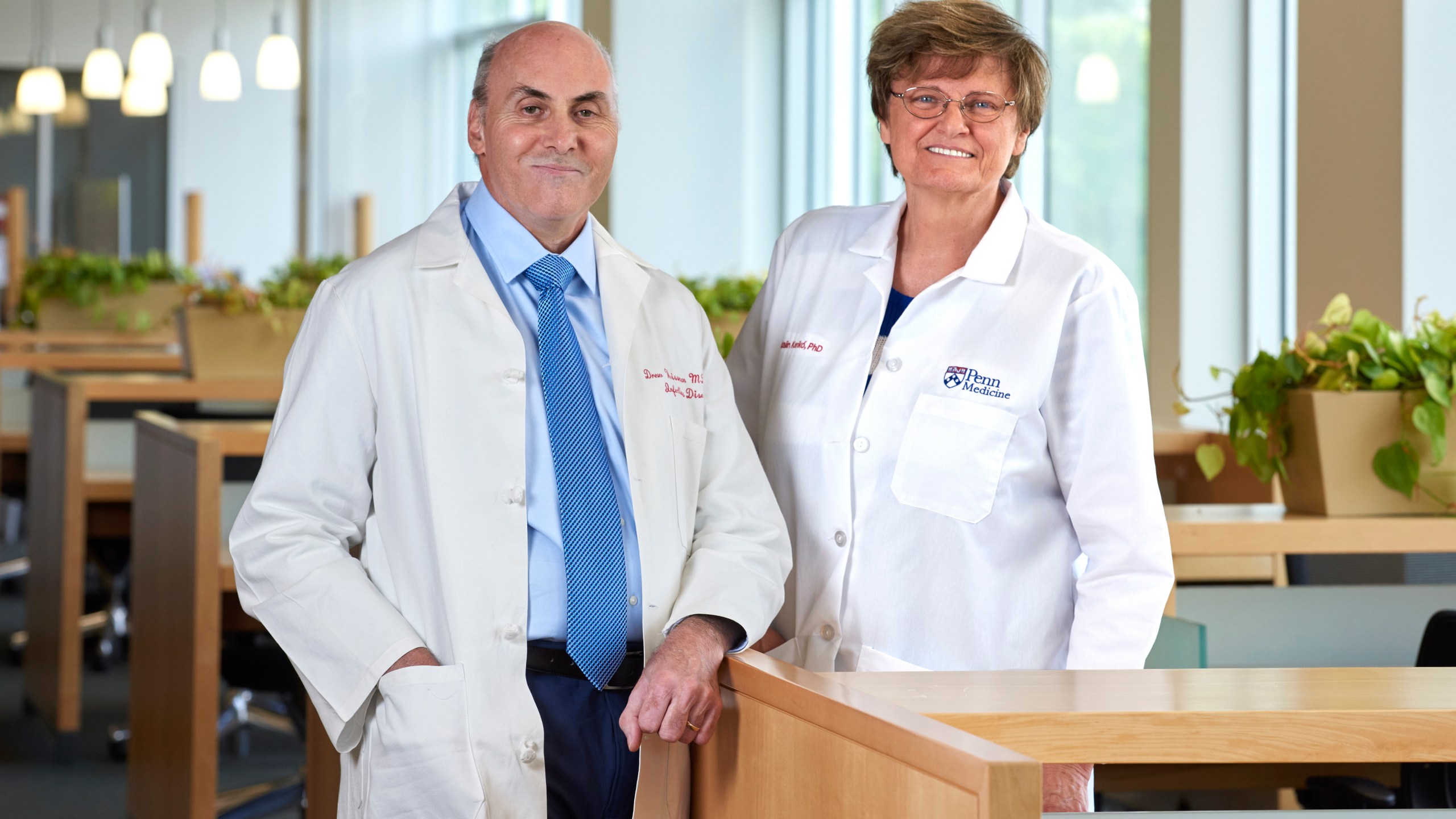 In this undated image provided by Penn Medicine, Katalin Karikó and Drew Weissman pose for a photo at the University of Pennsylvania in Philadelphia. Karikó and Weissman won the Nobel Prize in medicine on Monday, Oct. 2, 2023, for discoveries that enabled the creation of mRNA vaccines against COVID-19 and that could be used to develop other shots in the future. (Peggy Peterson Photography/Penn Medicine via AP)