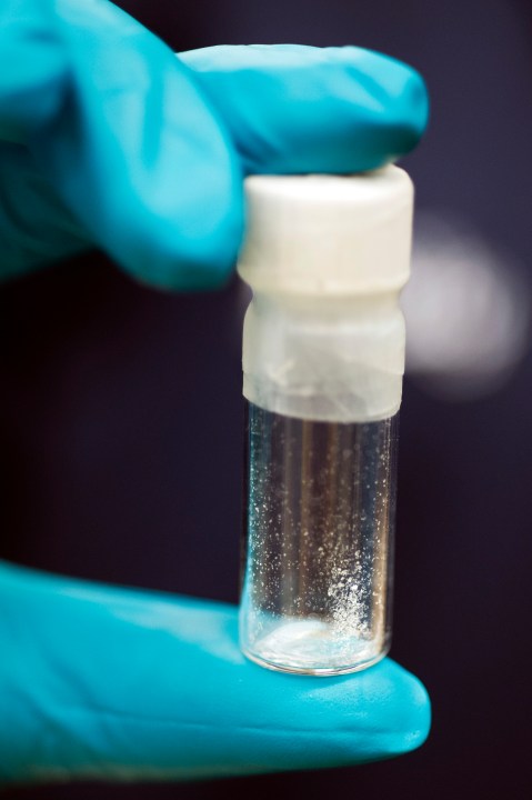 FILE - A vial containing 2mg of fentanyl, is displayed at the Drug Enforcement Administration (DEA) Special Testing and Research Laboratory in Sterling, Va., Aug. 9, 2016. The US is announcing a series of indictments and sanctions against 14 people and 14 firms across China and Canada related to the import of fentanyl into the United States. It's one of the biggest actions the Biden administration has taken against the trafficking of the deadly drug. (AP Photo/Cliff Owen, File)