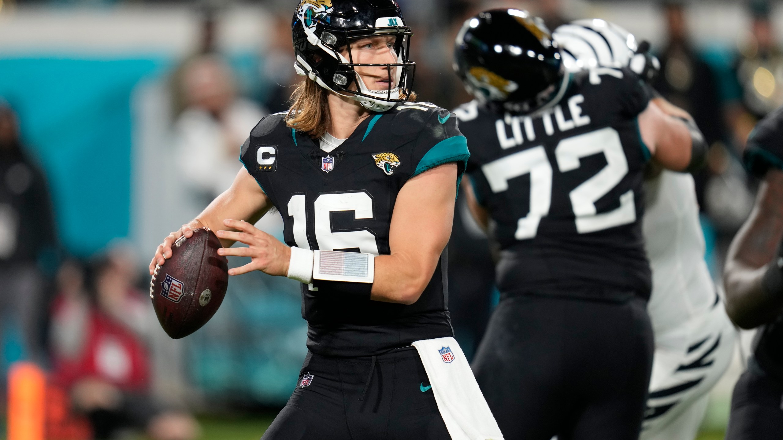 Jacksonville Jaguars quarterback Trevor Lawrence (16) aims a pass during the second half of an NFL football game against the Cincinnati Bengals, Monday, Dec. 4, 2023, in Jacksonville, Fla. (AP Photo/John Raoux)