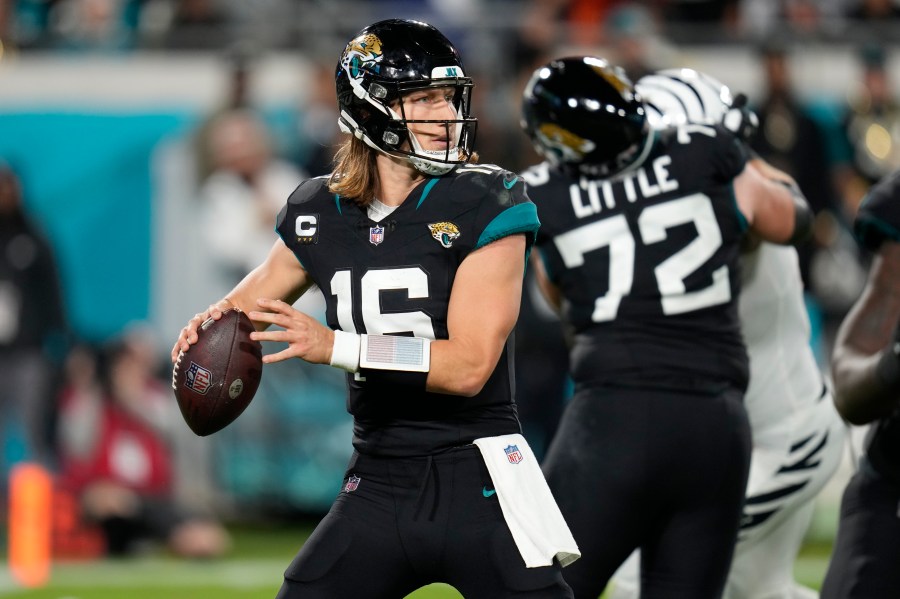 Jacksonville Jaguars quarterback Trevor Lawrence (16) aims a pass during the second half of an NFL football game against the Cincinnati Bengals, Monday, Dec. 4, 2023, in Jacksonville, Fla. (AP Photo/John Raoux)