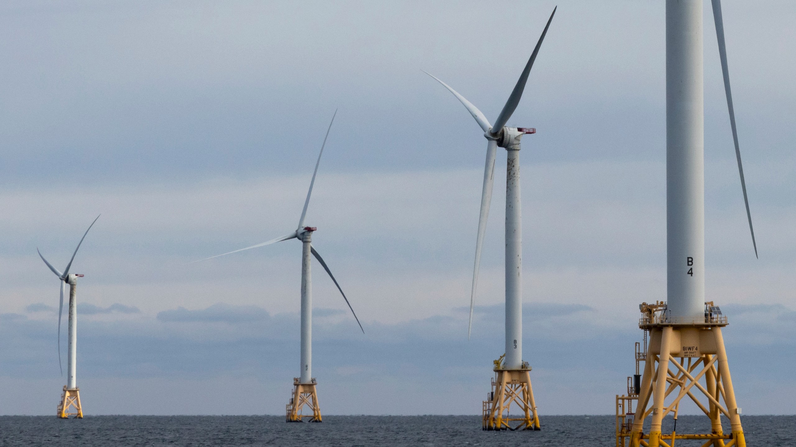 The five turbines of Block Island Wind Farm operate, Thursday, Dec. 7, 2023, off the coast of Block Island, R.I., during a tour of the North Fork Wind farm organized by Orsted. (AP Photo/Julia Nikhinson)