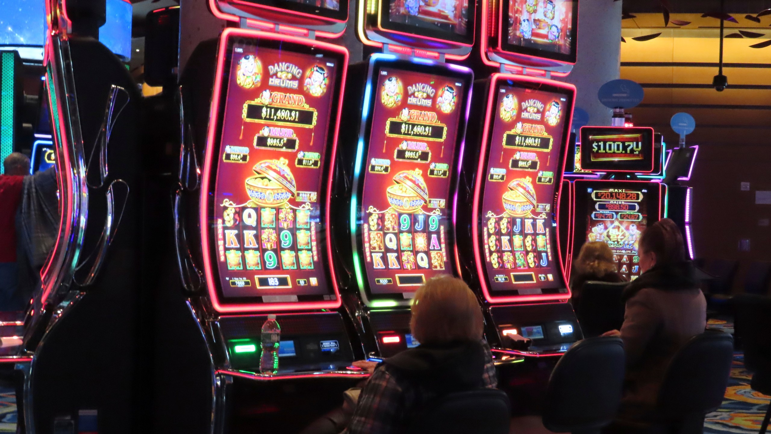 Gamblers play slot machines at the Ocean Casino Resort in Atlantic City, N.J. on Nov. 29, 2023. Internet gambling and sports betting both set new records in November as gamblers continue to take advantage of more options in addition to traveling to physical casinos in order to wager. (AP Photo/Wayne Parry)