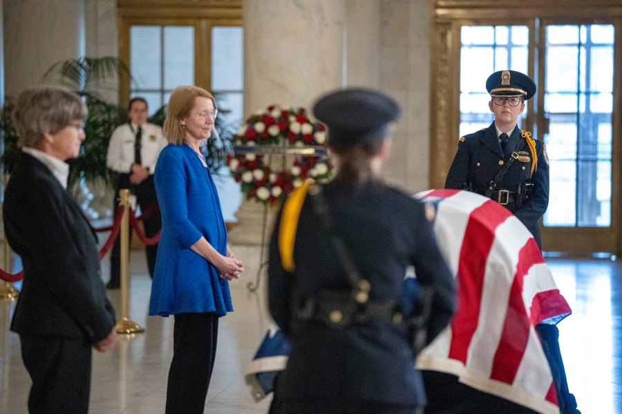 Former law clerks for retired Supreme Court Justice Sandra Day O'Connor stand at the casket during public repose in the Great Hall at the Supreme Court in Washington, Monday, Dec. 18, 2023. O'Connor, a Arizona native and the first woman to serve on the nation's highest court, died Dec. 1 at age 93. (AP Photo/Alex Brandon)