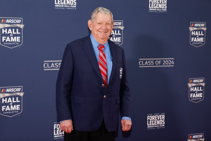 Donnie Allison poses for photographers as he arrives for his induction into the NASCAR Hall of Fame in Charlotte, N.C., Friday, Jan. 19, 2024. (AP Photo/Nell Redmond)