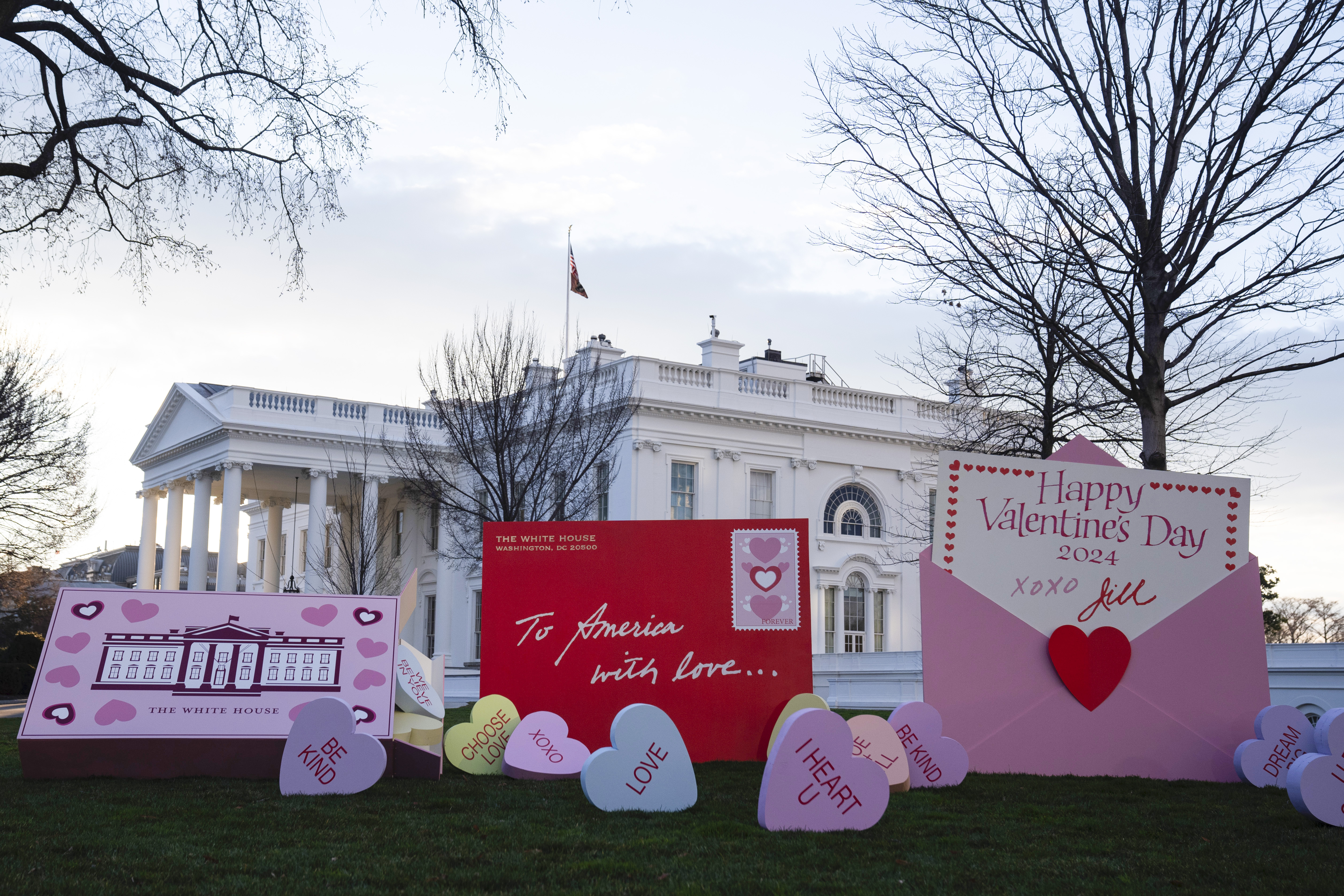 Decorations for Valentine's Day adorn the White House lawn, Wednesday, Feb. 14, 2024, in Washington. (AP Photo/Evan Vucci)