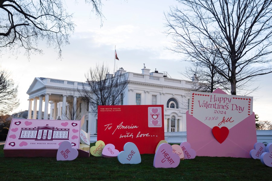 Decorations for Valentine's Day adorn the White House lawn, Wednesday, Feb. 14, 2024, in Washington. (AP Photo/Evan Vucci)