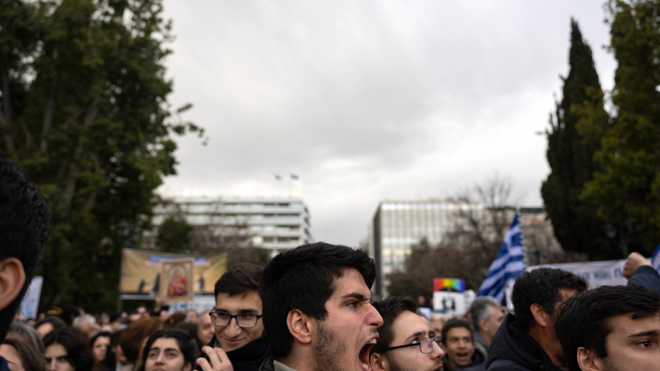 A protester shouts slogans during a rally against same-sex marriage, at central Syntagma Square, in Athens, Greece, Sunday, Feb. 11, 2024. Lawmakers begin a debate Wednesday on a landmark bill to legalize same-sex marriage that would make Greece the first Orthodox Christian country to do so. (AP Photo/Yorgos Karahalis)