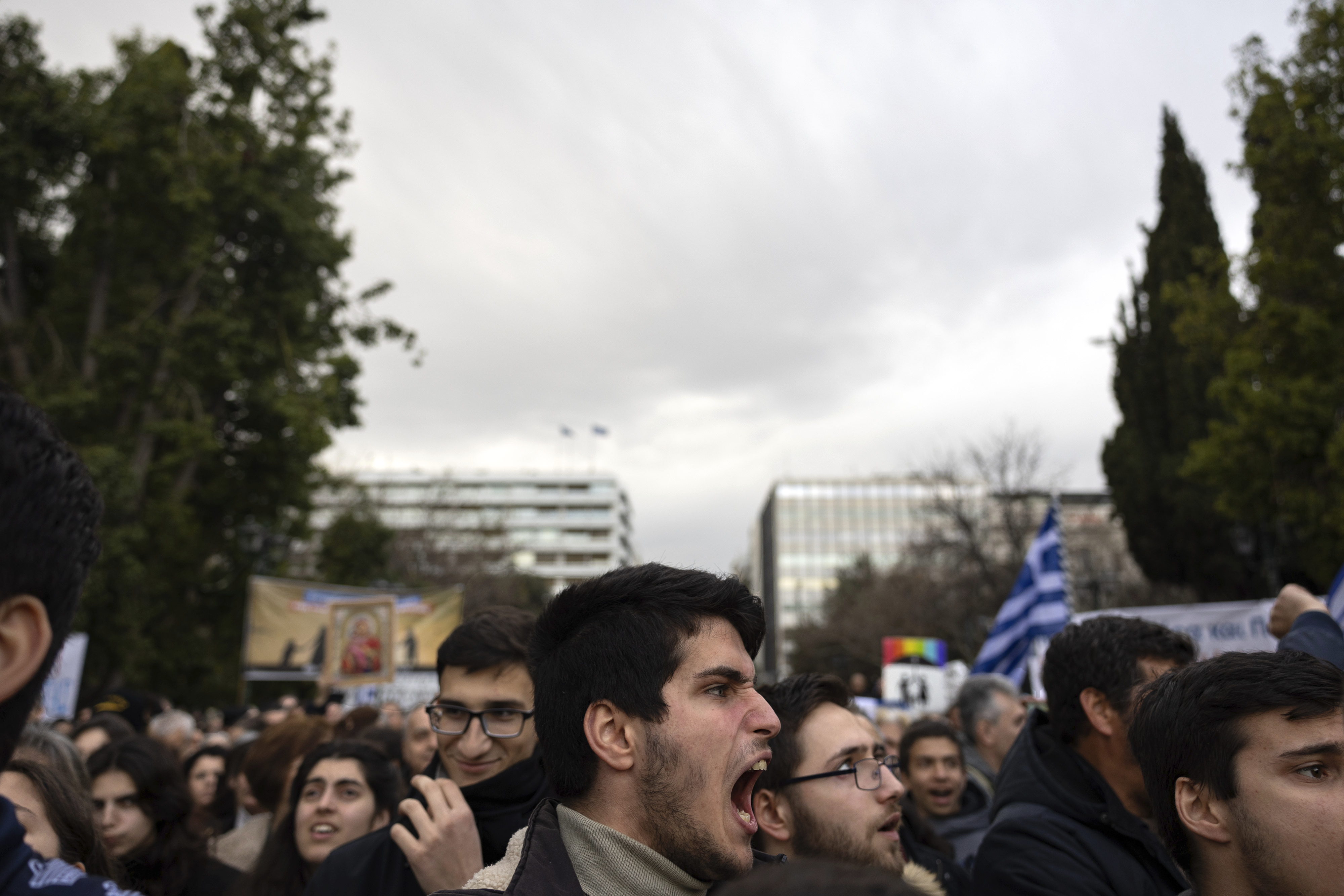 A protester shouts slogans during a rally against same-sex marriage, at central Syntagma Square, in Athens, Greece, Sunday, Feb. 11, 2024. Lawmakers begin a debate Wednesday on a landmark bill to legalize same-sex marriage that would make Greece the first Orthodox Christian country to do so. (AP Photo/Yorgos Karahalis)