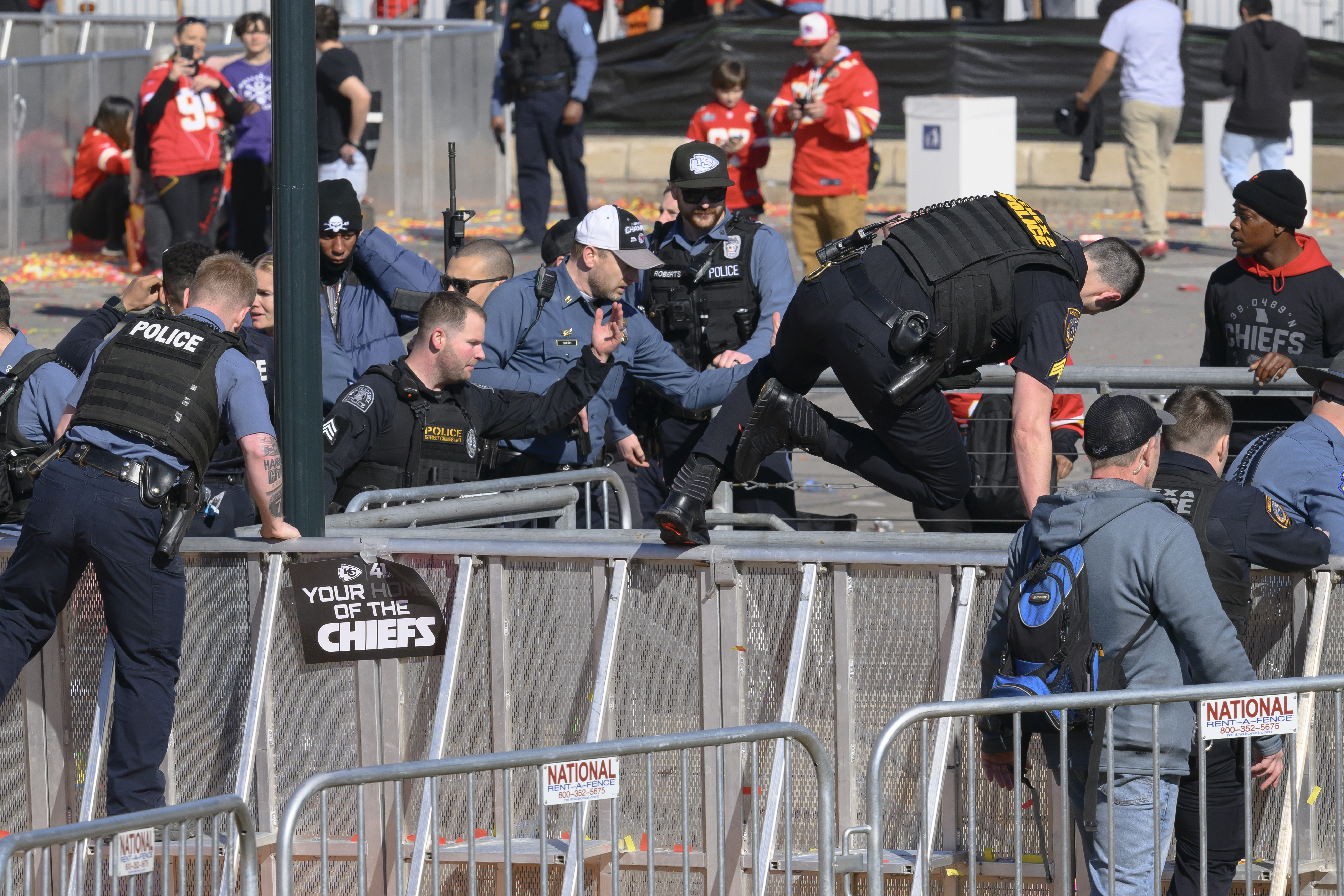 FILE - Law enforcement personnel clear the area around Union Station following a shooting at the Kansas City Chiefs NFL football Super Bowl celebration in Kansas City, Mo., Wednesday, Feb. 14, 2024. (AP Photo/Reed Hoffmann, File)