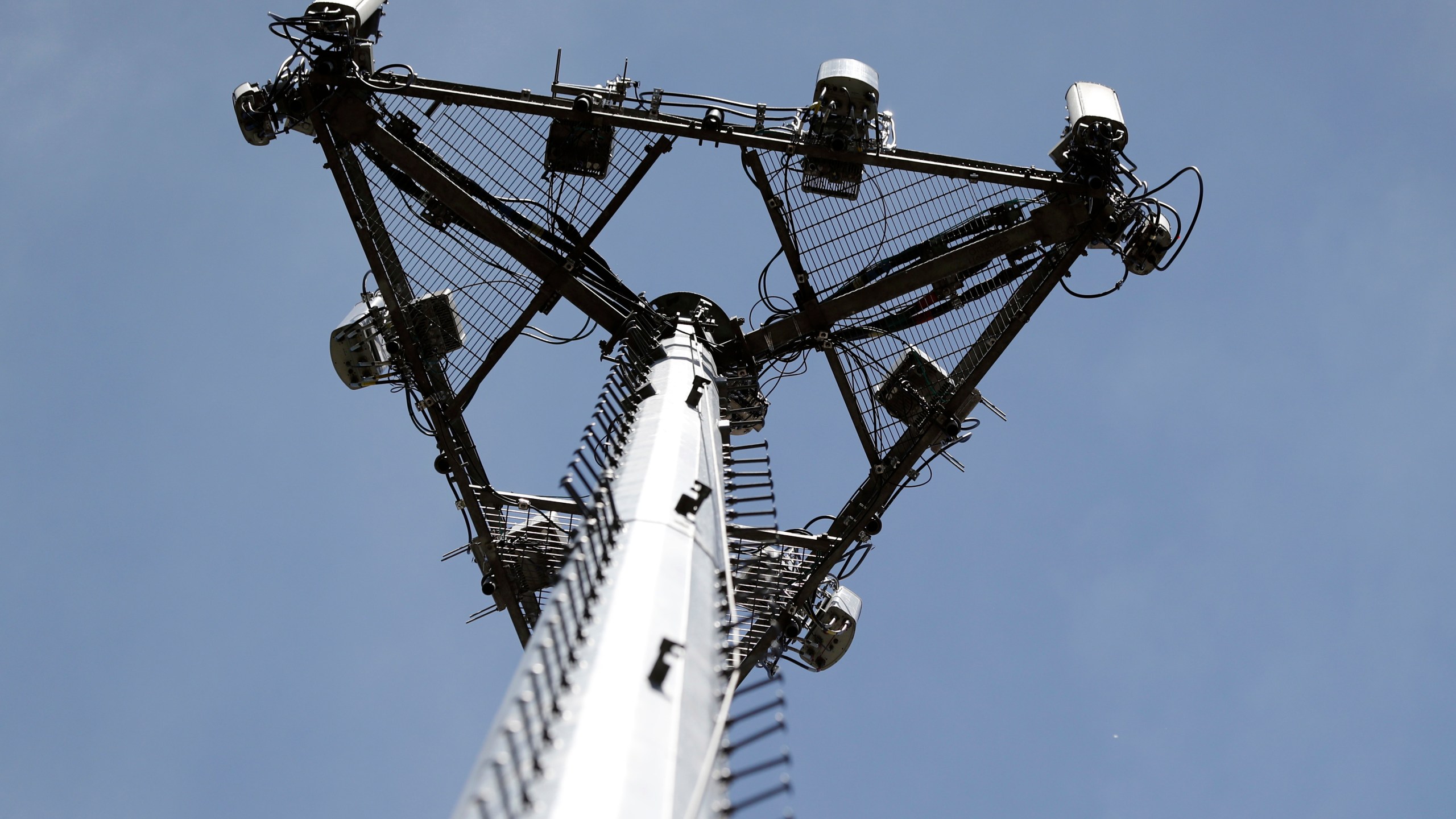 FILE _ A cellular phone tower is shown on Monday, May 22, 2017 in High Ridge, Mo. A number of Americans are dealing with cellular outages Thursday, Feb. 22, 2024, on AT&T, Cricket Wireless, Verizon, T-Mobile and other service providers, according to data from Downdetector. (AP Photo/Jeff Roberson)