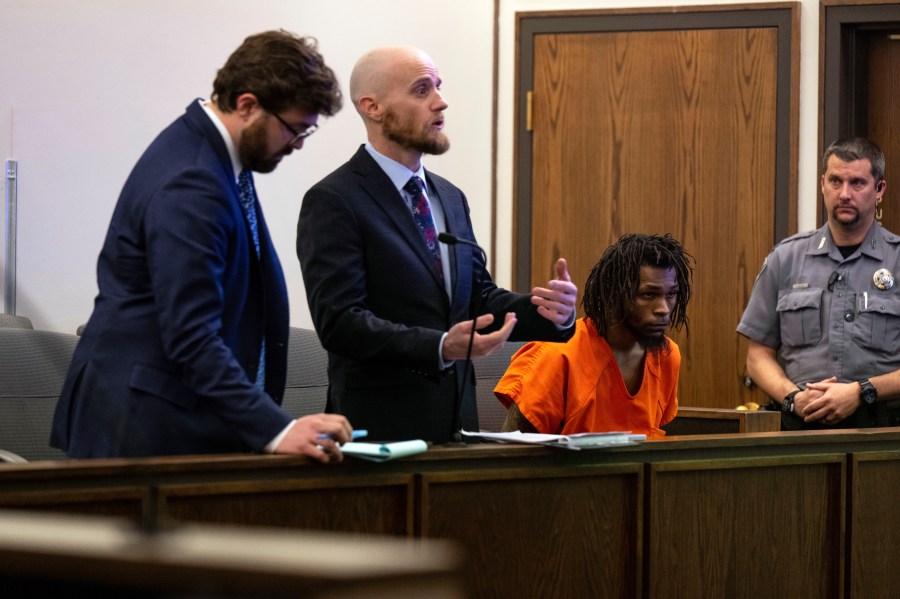 Nicholas Jordan sits in the jurors box as Nick Rogers, second left, from the Public Defenders Office, who is representing Jordan, addresses the court during Jordan first appearance at El Paso County 4th Judicial Court Friday, Feb. 23, 2024, in Colorado Springs Colo. Jordan was arrested Monday, Feb. 19, in the deaths of his roommate, Samuel Knopp, 24, and Celie Rain Montgomery, 26, at the University of Colorado Colorado Springs. (Parker Seibold/The Gazette via AP, Pool)