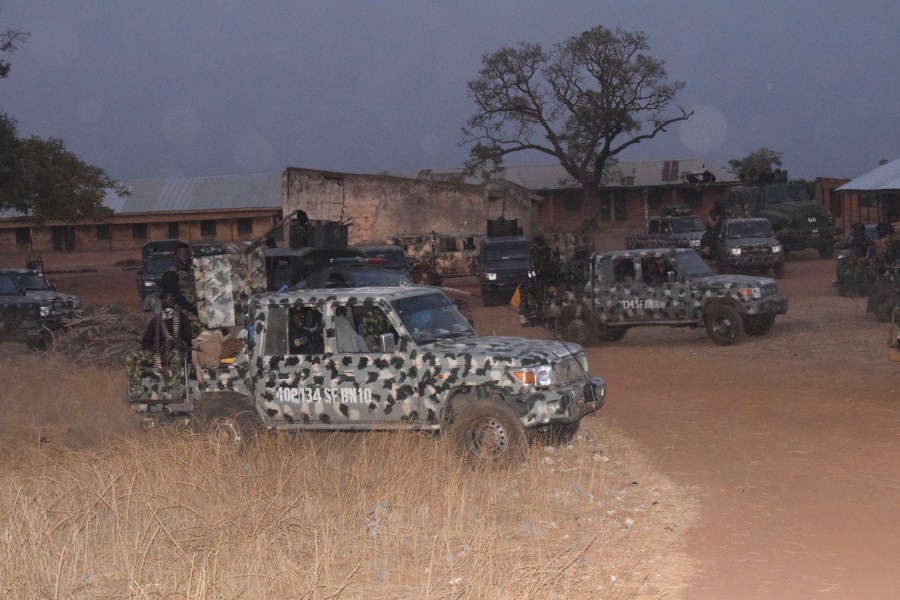 Nigeria army trucks are park in an area were gunmen kidnapped school children in Chikun, Nigeria, Thursday, March. 7, 2024. Gunmen attacked a school in Nigeria's northwest region Thursday morning and abducted at least 287 students, the headteacher told authorities, marking the second mass abduction in the West African nation in less than a week. (AP Photo)