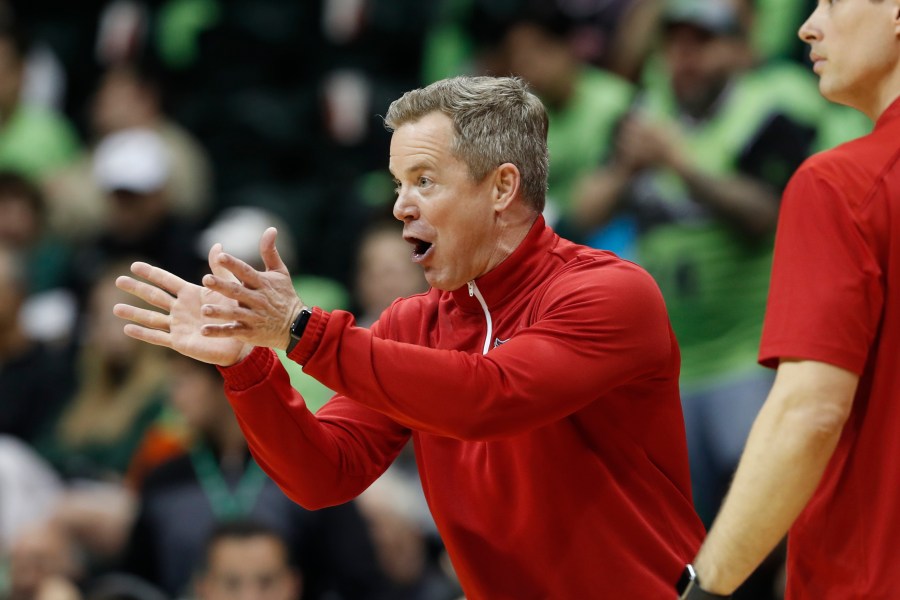 FILE - Florida Atlantic head coach Dusty May reacts during the second half of an NCAA college basketball game against South Florida, Sunday, Feb. 18, 2024, in Tampa, Fla. May is one of the hottest commodities in coaching. His name is been linked to openings at Louisville, Ohio State, Michigan and Vanderbilt. And his eight-seeded Owls start NCAA play Friday in New York against ninth-seeded Northwestern. (AP Photo/Scott Audette, File)