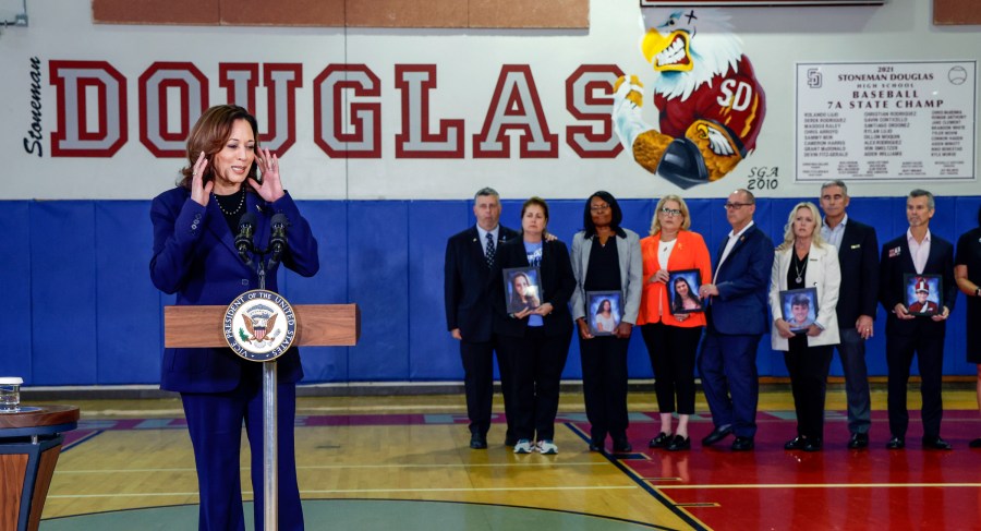 Vice President Kamala Harris speaks to the media after she and the White House Office of Gun Violence Prevention met with families whose loved ones were murdered during the 2018 mass shooting that took the lives of 14 students and three staff members at Marjory Stoneman Douglas High School in Parkland, Fla., Saturday, March 23, 2024. (Al Diaz/Miami Herald via AP)