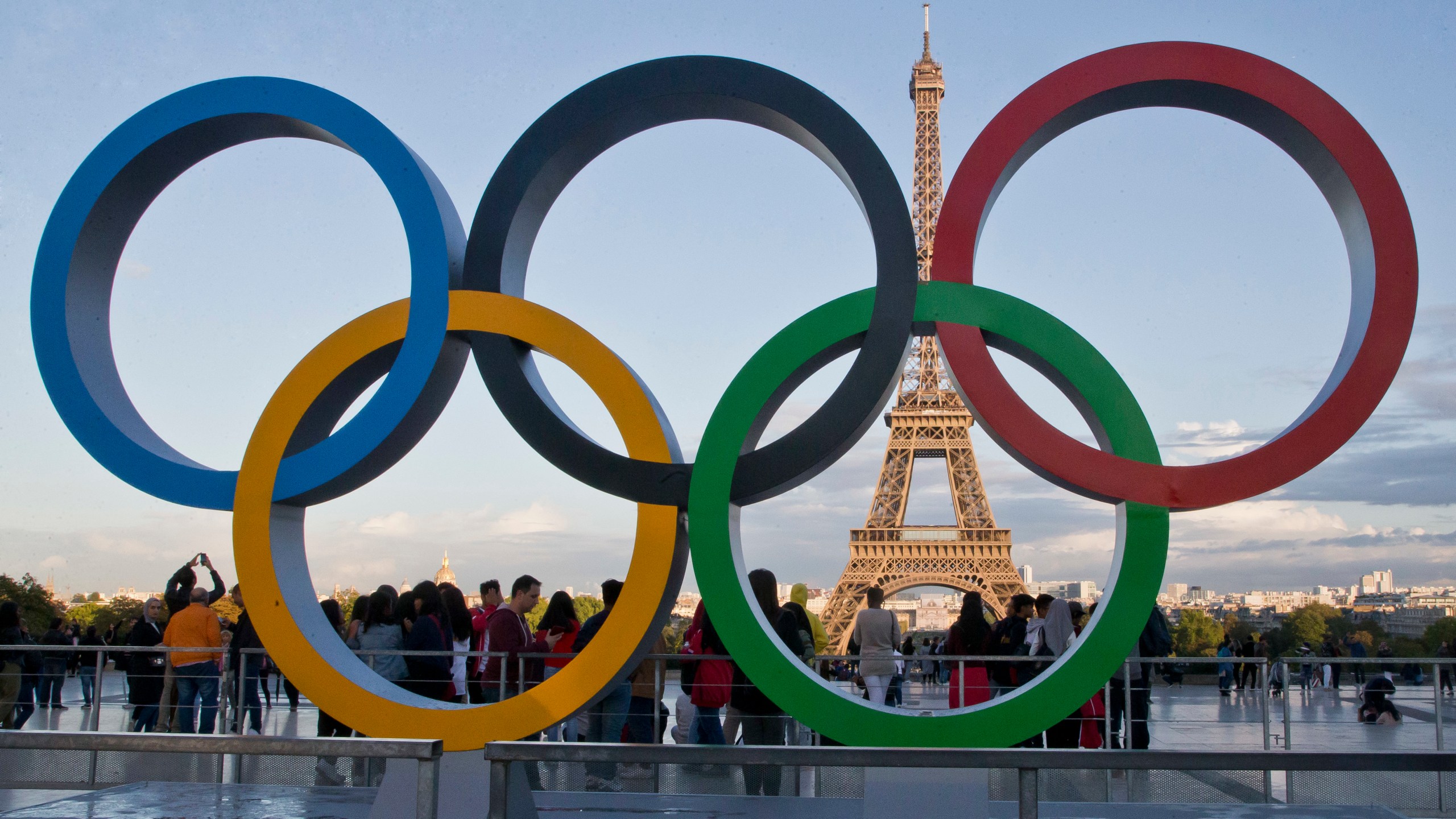 FILE - The Olympic rings are set up at Trocadero plaza that overlooks the Eiffel Tower in Paris on Sept. 14, 2017. The United States and China are expected to finish 1-2 in the gold and the overall medal counts at the Paris Olympics, which open in 100 days. (AP Photo/Michel Euler, File)