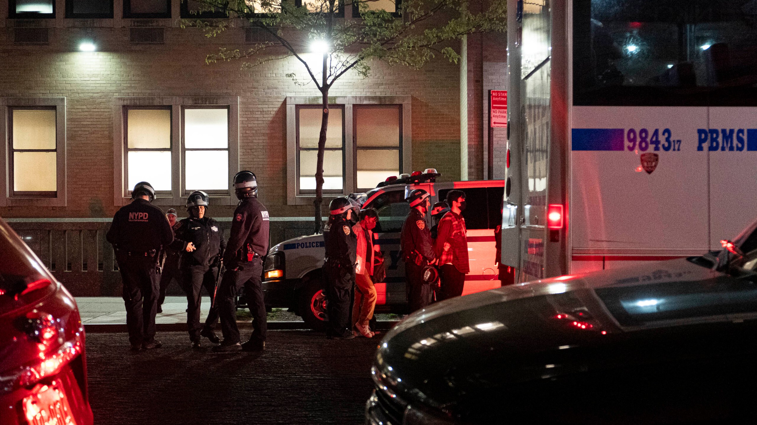 Officers with the New York Police Department stand outside Columbia University's Hamilton Hall as they disperse Pro-Palestine students and protestors occupying Hamilton Hall on Tuesday evening, April 30, 2024 in New York. Members of the occupation took over Hamilton Hall in the early hours of Tuesday morning. (Seyma Bayram via AP)