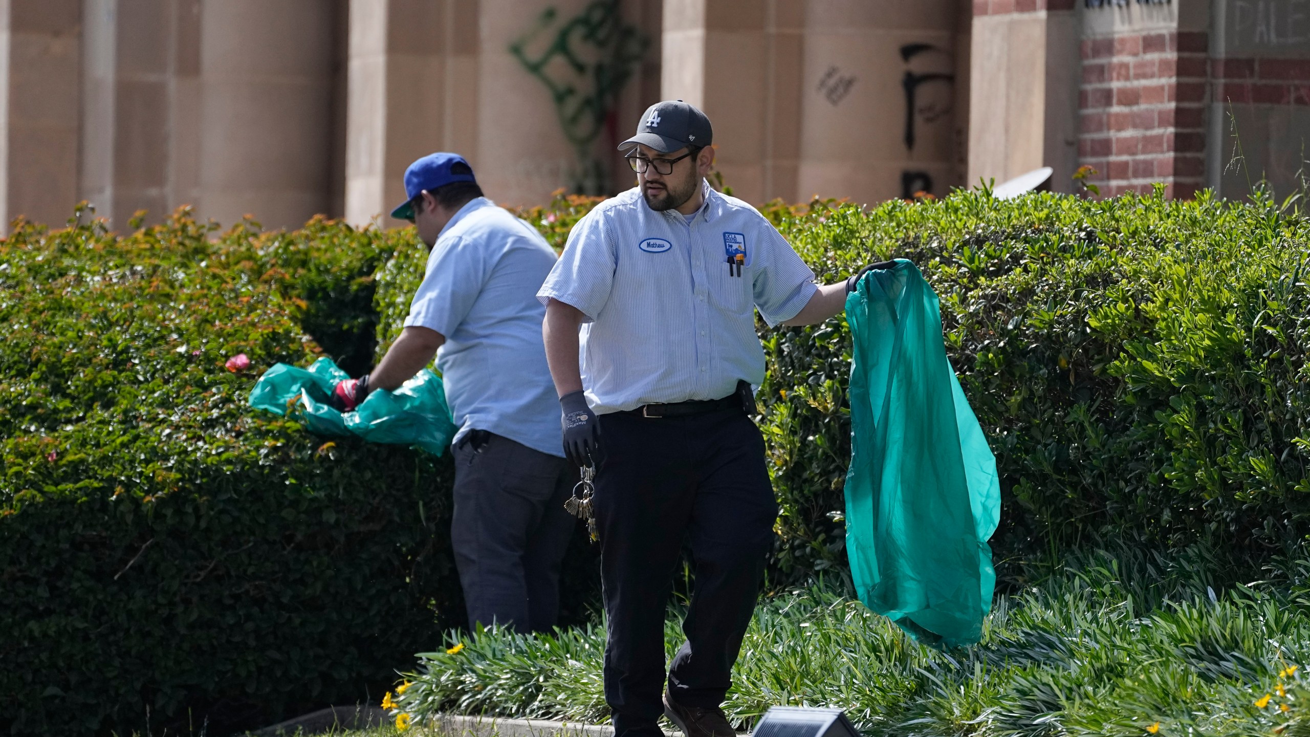 Cleanup continues on the site of a pro-Palestinian encampment, cleared by police overnight, on the UCLA campus Thursday, May 2, 2024, in Los Angeles. (AP Photo/Mark J. Terrill)