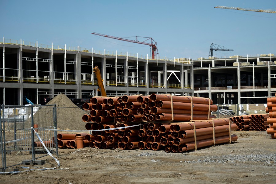 Construction is underway for a battery factory for electric vehicles built by China-based Contemporary Amperex Technology Co. Limited (CATL) in Debrecen, Hungary, Sunday, May 5, 2024. Hungary's government has deepened its economic ties with China, with the proliferation of Chinese electric vehicle (EV) battery factories across the country gaining the most attention. Near Debrecen, construction is underway of a nearly 550-acre, 7.3 billion euro ($7.9 billion) EV battery plant, Hungary's largest-ever foreign direct investment. (AP Photo/Denes Erdos)