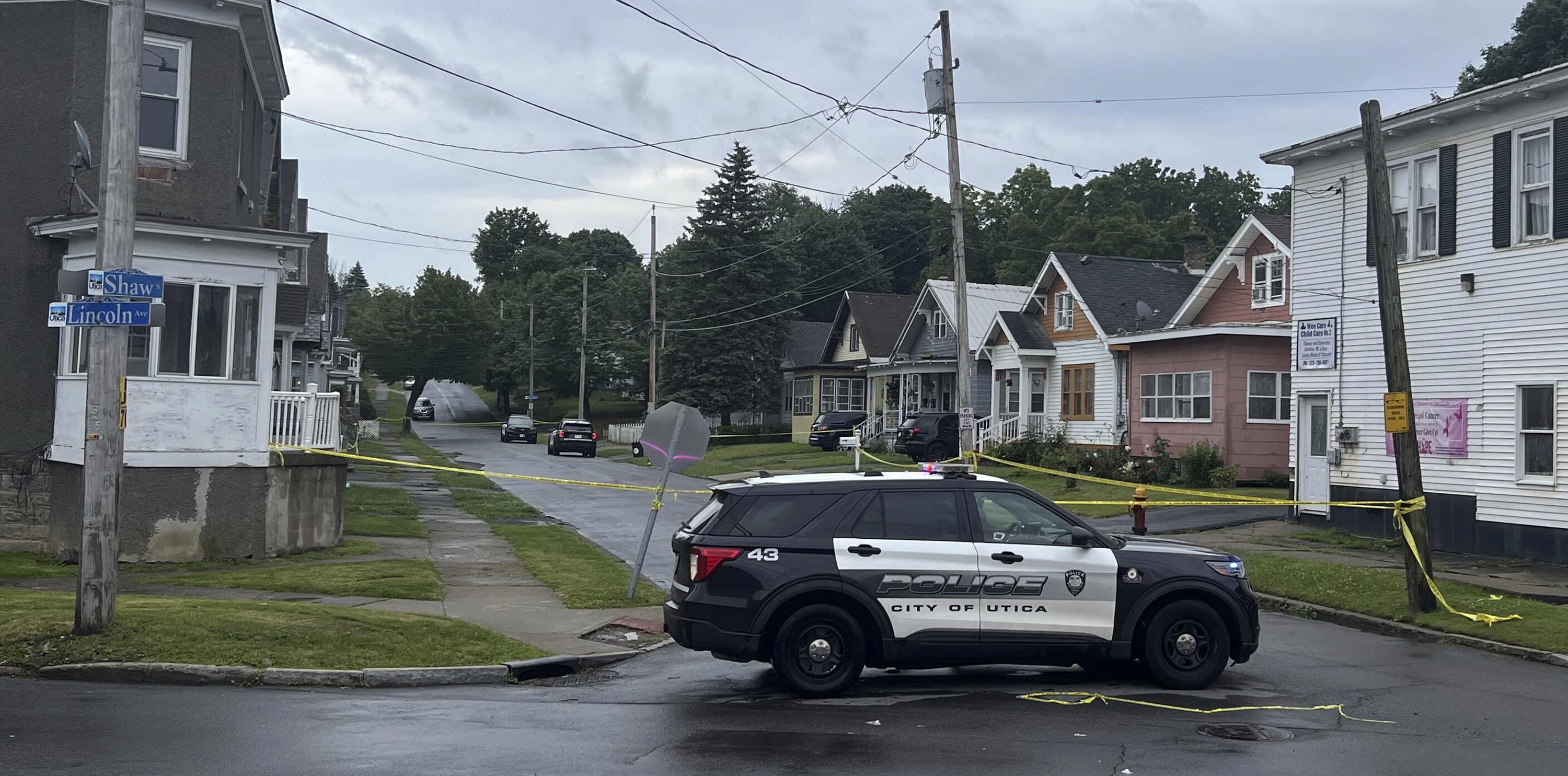 Police investigate the scene of Friday nights shooting in Utica, N.Y., early Saturday, June 29, 2024. An officer shot and killed a teen fleeing while pointing a replica gun, police said Saturday. (Kenny Lacy Jr./Syracuse.com via AP)