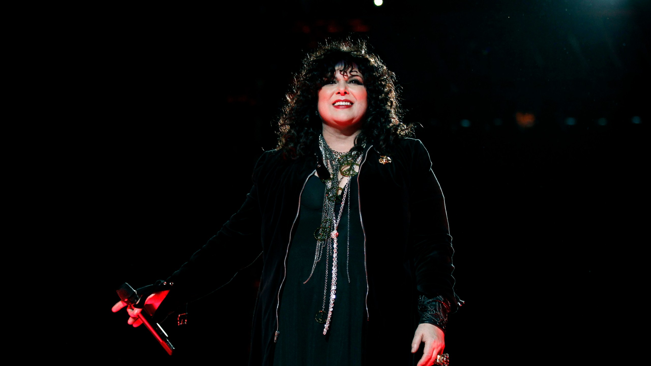 FILE - Ann Wilson, of the band Heart, performs onstage at the "Vh1 Divas Salute the Troops" on Friday, Dec. 3, 2010 in San Diego. Wilson says she has cancer. The band is postponing the remaining shows on its Royal Flush Tour. (AP Photo/Matt Sayles, File)
