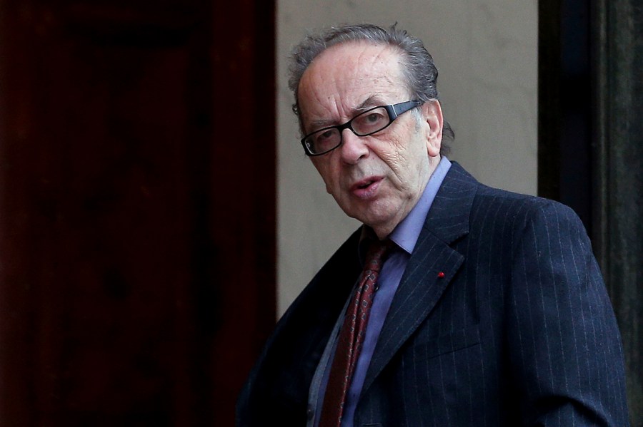 FILE - Albanian novelist Ismail Kadare arrives at the Elysee Palace to receive the France's Legion d'Honneur medal by French President Francois Hollande, in Paris, on May 30, 2016. Renowned Albanian novelist Kadare has died after being rushed to a hospital in the Albanian capital, his publishing editor said on Monday. He was 88. (AP Photo/Thibault Camus, File)