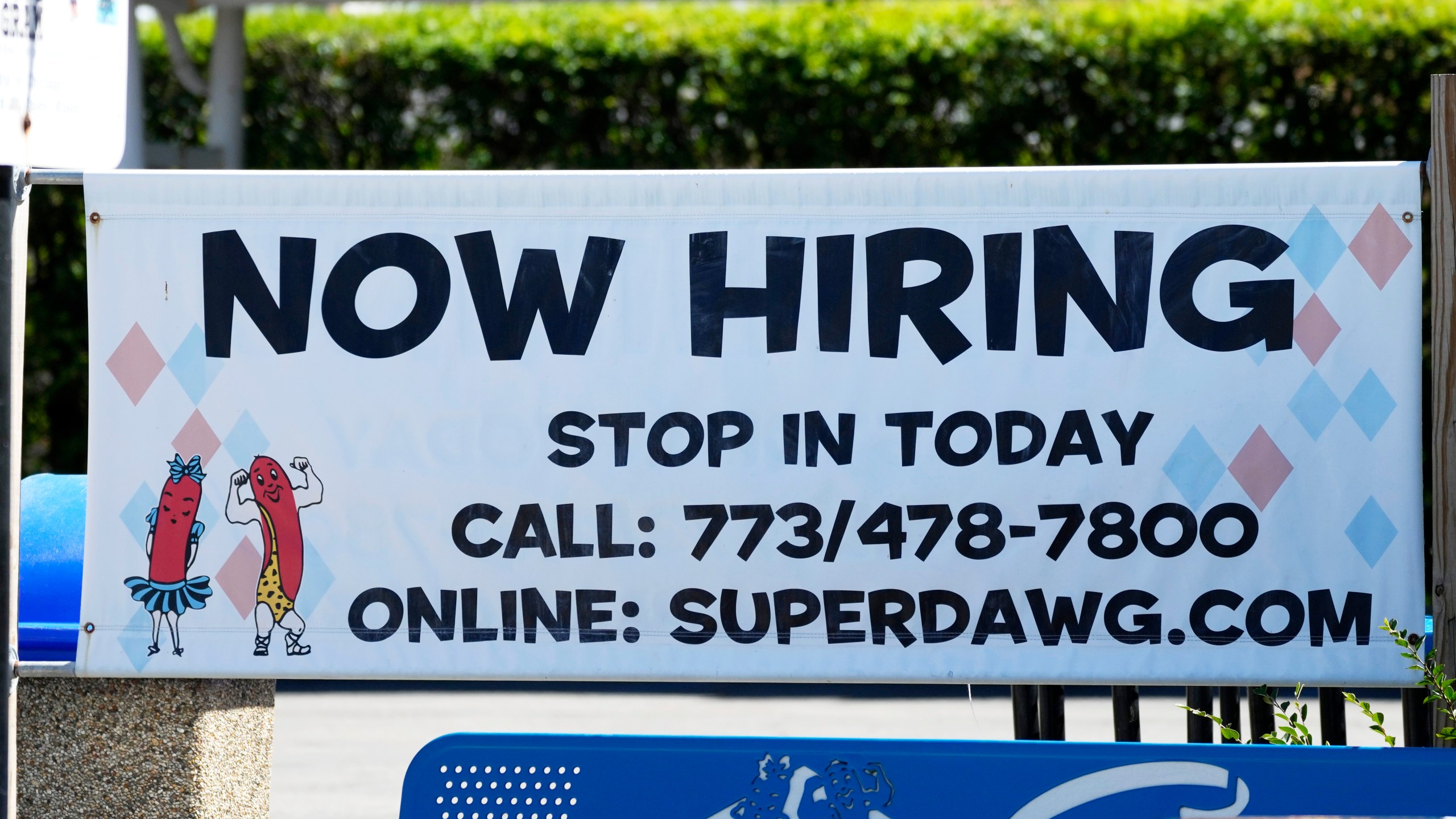 A hiring sign is displayed at a restaurant in Chicago, Monday, July 1, 2024. On Wednesday, July 3, 2024, the Labor Department reports on the number of people who applied for unemployment benefits last week. (AP Photo/Nam Y. Huh)