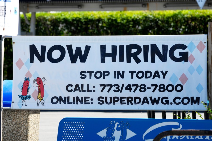 A hiring sign is displayed at a restaurant in Chicago, Monday, July 1, 2024. On Wednesday, July 3, 2024, the Labor Department reports on the number of people who applied for unemployment benefits last week. (AP Photo/Nam Y. Huh)