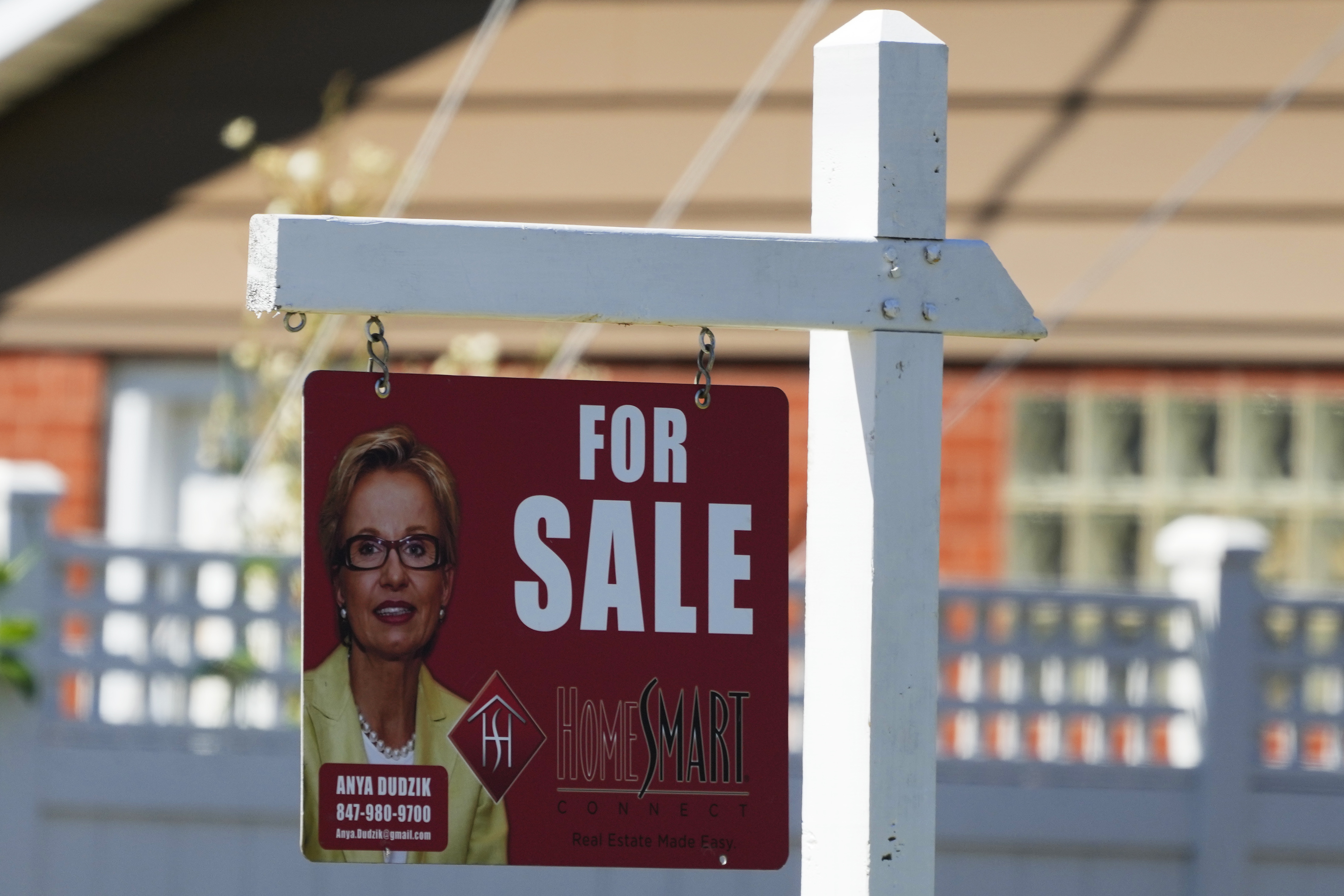 A for sale sign stands outside a residence in Niles, Ill., Monday, July 1, 2024. On Wednesday, July 3, 2024, the Labor Department reports on the number of people who applied for unemployment benefits last week. (AP Photo/Nam Y. Huh)