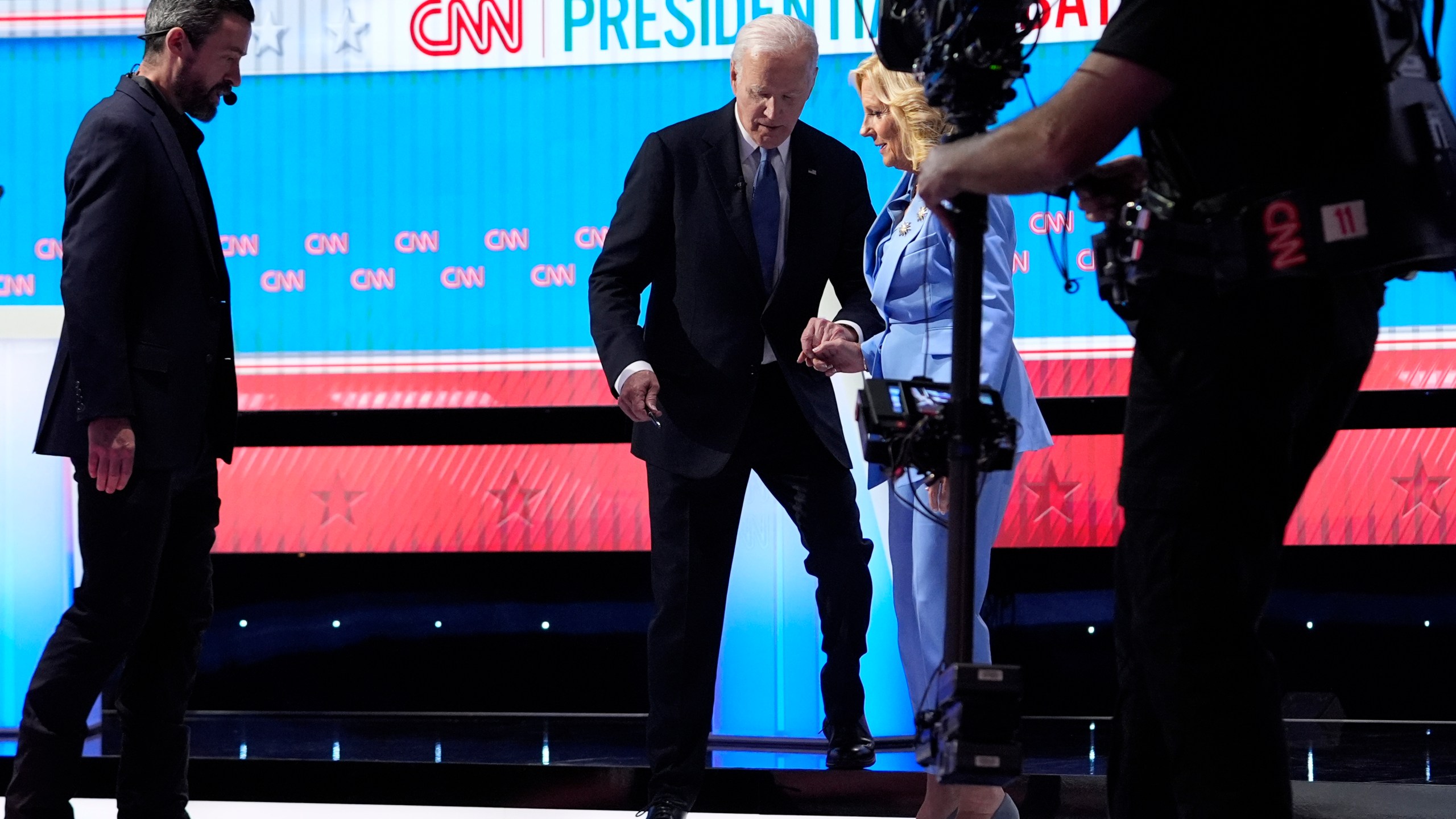 FILE - President Joe Biden, from second left, and first lady Jill Biden, walk off stage at the endof a presidential debate with Republican presidential candidate former President Donald Trump June 27, 2024, in Atlanta. (AP Photo/Gerald Herbert, File)