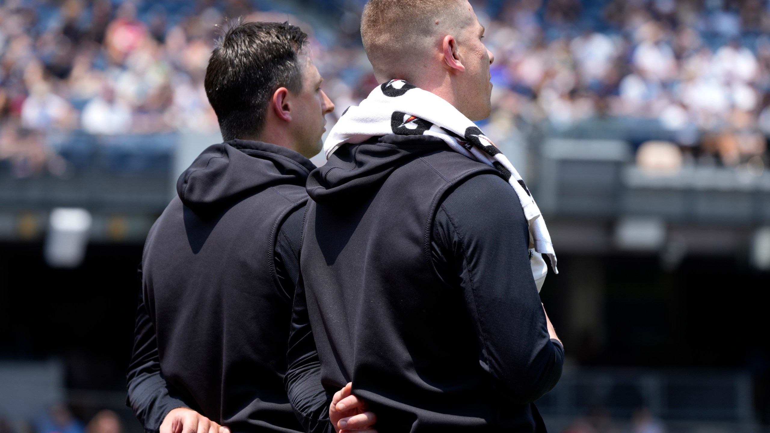 New York Yankees' Cody Poteet, left, and Ian Hamilton, right, stand after the national anthem before the first inning of a baseball game against the Cincinnati Reds, Thursday, July 4, 2024, in New York. (AP Photo/Pamela Smith)