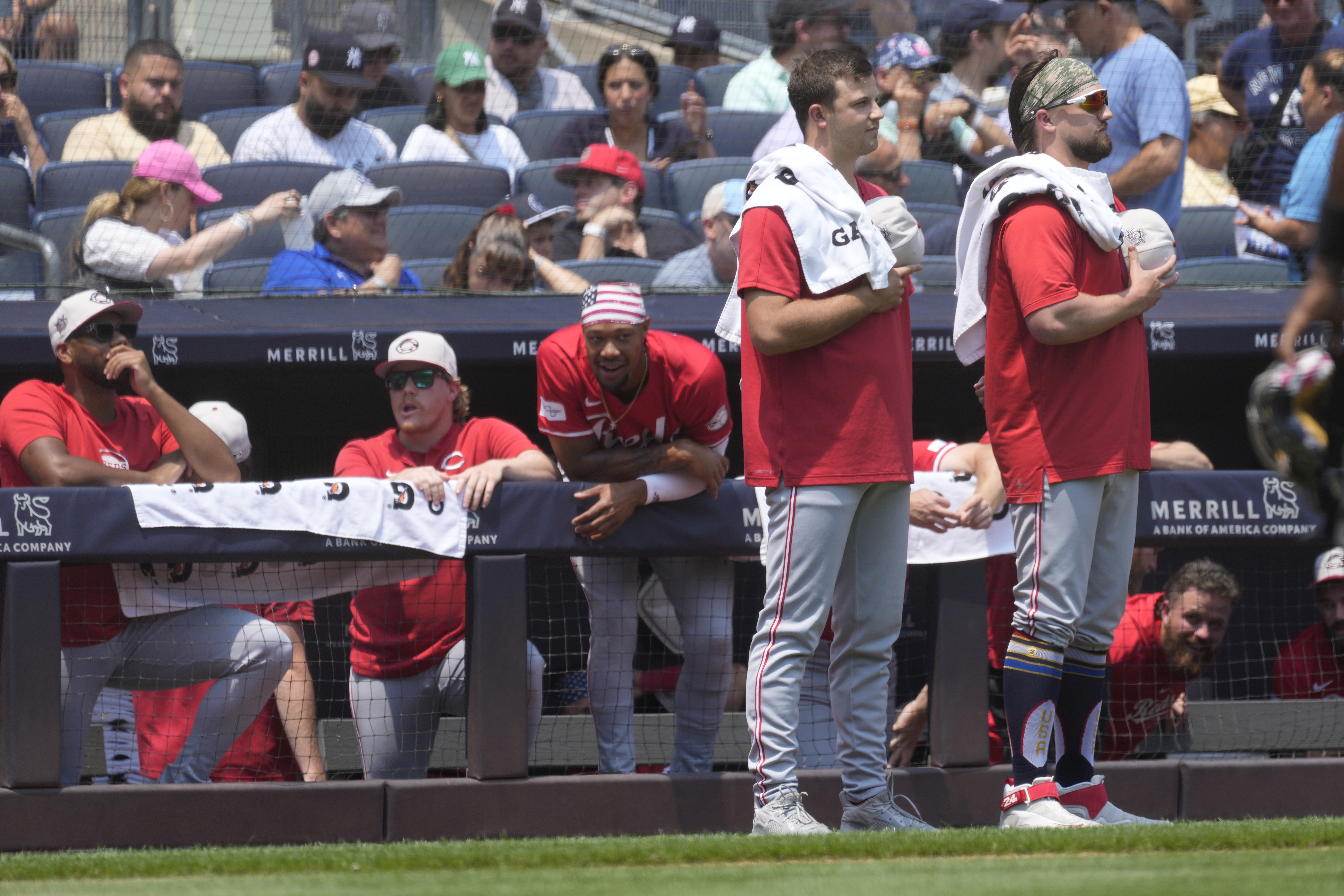 Cincinnati Reds' Carson Spiers, left, and Graham Ashcraft, right, stand after the national anthem before the first inning of a baseball game against the New York Yankees, Thursday, July 4, 2024, in New York. (AP Photo/Pamela Smith)