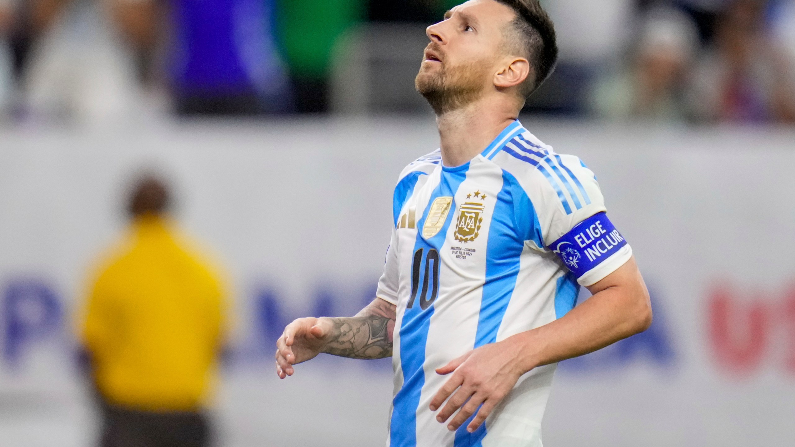 Argentina's Lionel Messi looks up after missing to score in a penalty shootout against Ecuador in a Copa America quarterfinal soccer match in Houston, Thursday, July 4, 2024. (AP Photo/Julio Cortez)