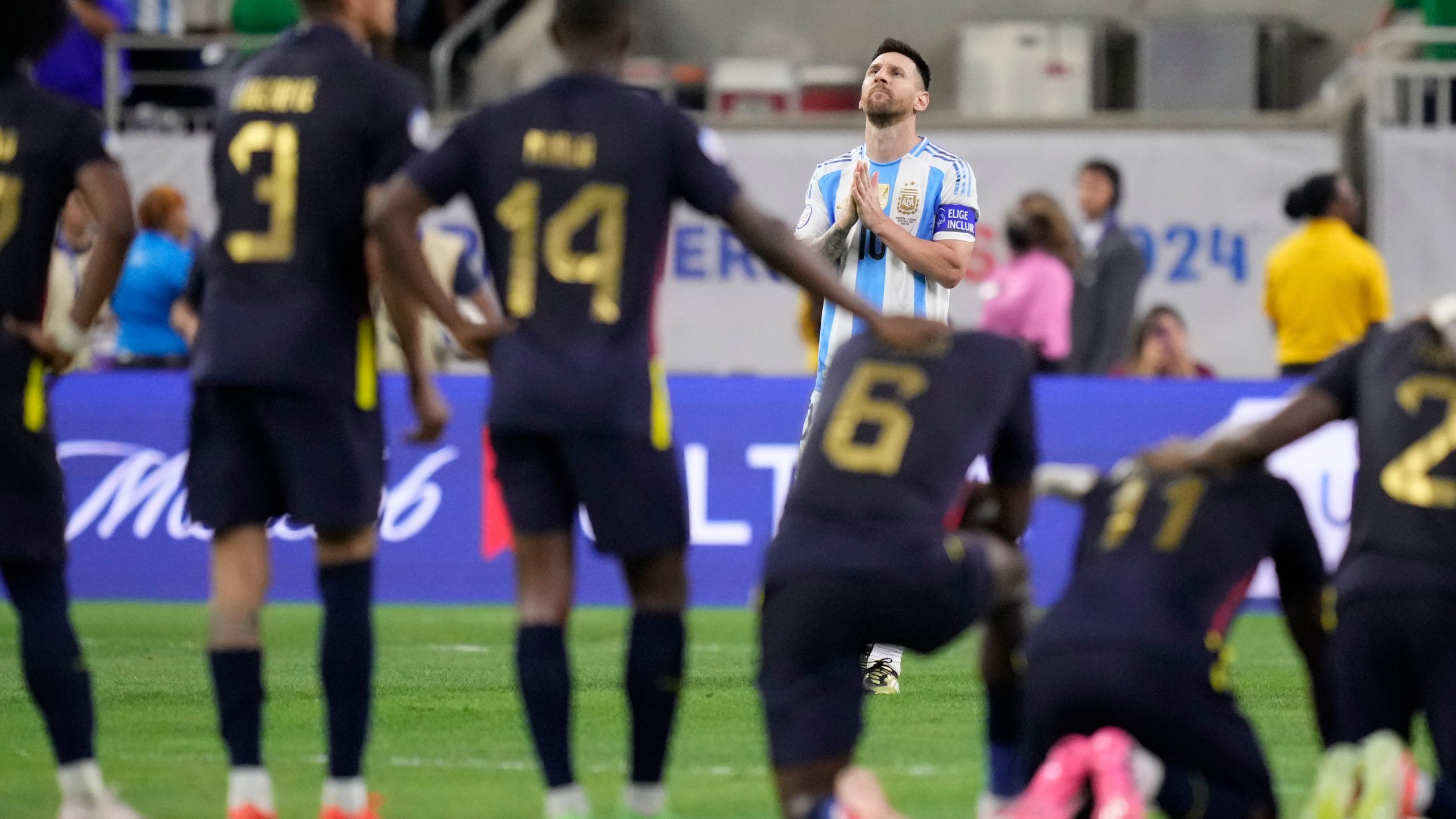 Argentina's Lionel Messi reacts during a penalty shootout against Ecuador at a Copa America quarterfinal soccer match in Houston, Thursday, July 4, 2024.(AP Photo/Kevin M. Cox)