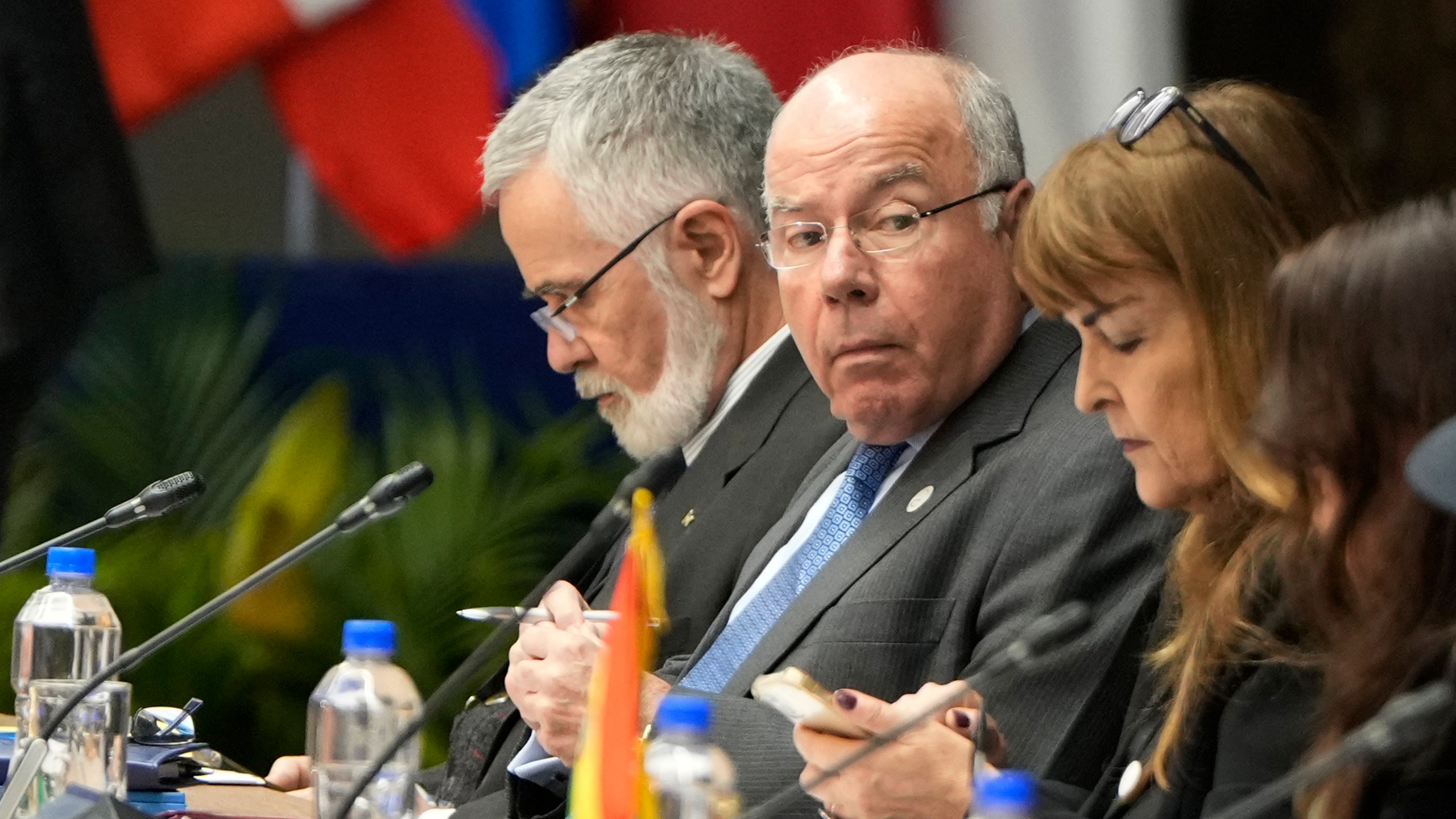 Brazil's Foreign Minister Mauro Vieira, center, attends a Mercosur summit session at the Port building in Asuncion, Paraguay, Sunday, July 7, 2024. Heads of state from South America's Mercosur trade bloc will gather in Asuncion on July 8. (AP Photo/Jorge Saenz)