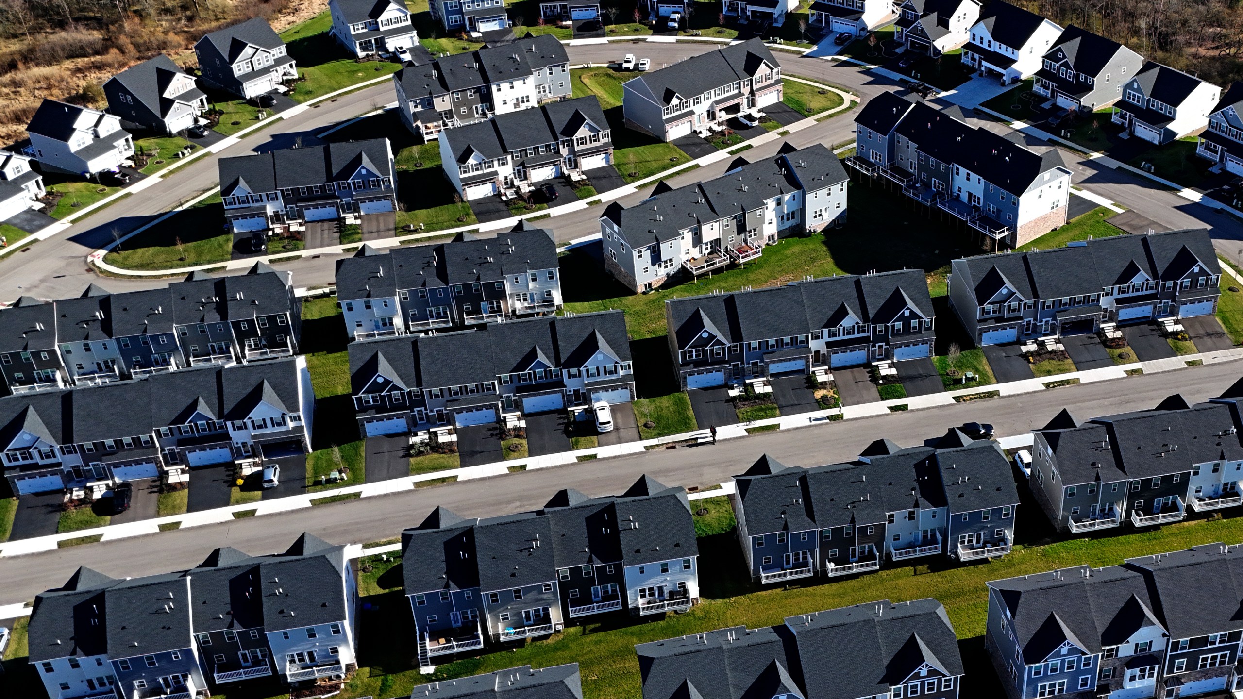 FILE - A housing development in Cranberry Township, Pa., is shown on March 29, 2024. The nation's housing market sales slump is dragging on into its third straight year, as evidenced by another weak spring home buying season. (AP Photo/Gene J. Puskar, File)