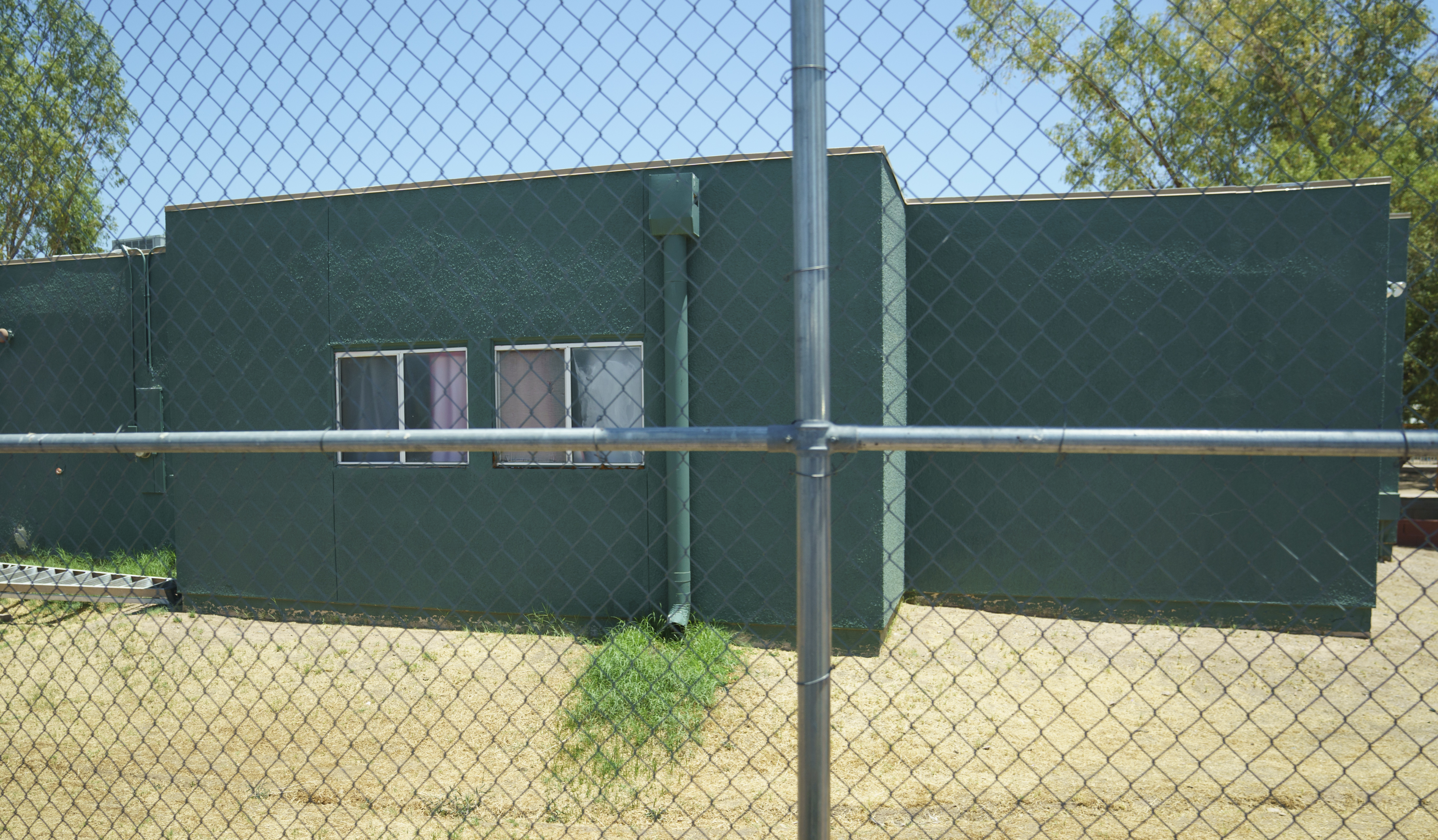 FILE - Buildings that house juveniles and operations on the grounds of Southwest Key Campbell, a shelter for children that have been separated from their parents, is shown June 28, 2018, in Phoenix. Southwest Key, the largest housing provider for unaccompanied migrant children has been accused of “severe, pervasive, and unwelcome sexual abuse of and harassment” of children in its care, the Justice Department said Thursday, July 18, 2024. (AP Photo/Carolyn Kaster, File)