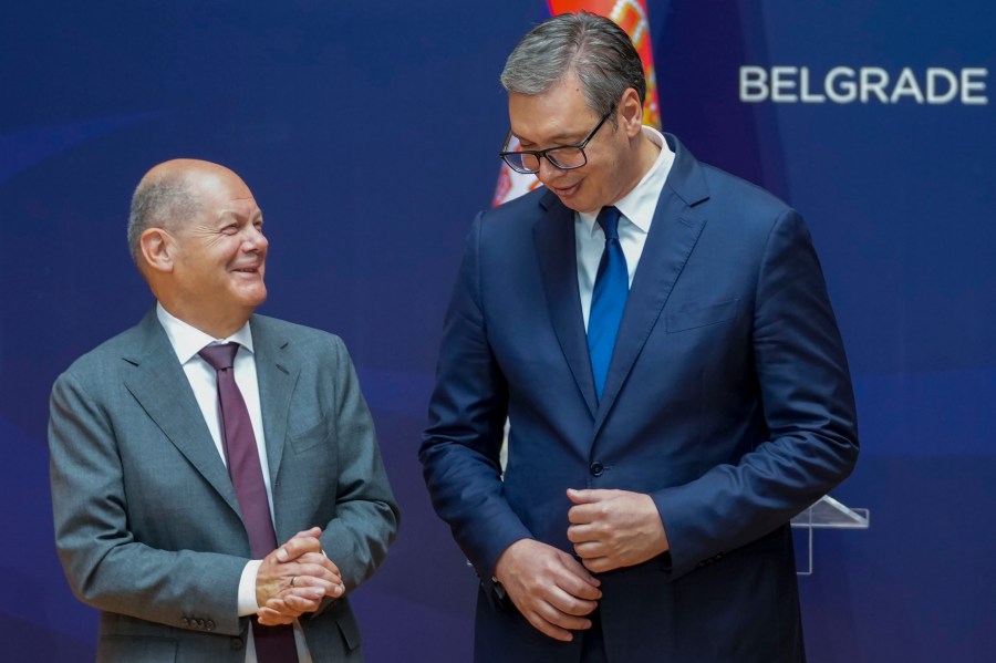 German Chancellor Olaf Scholz, left, and Serbian President Aleksandar Vucic leave after a press conference at the Serbia Palace in Belgrade, Serbia, Friday, July 19, 2024. Scholz visits Serbia to discuss a tentative deal with the Balkan country for the controversial excavation of lithium, a critical substance in making batteries for electric vehicles. (AP Photo/Darko Vojinovic)